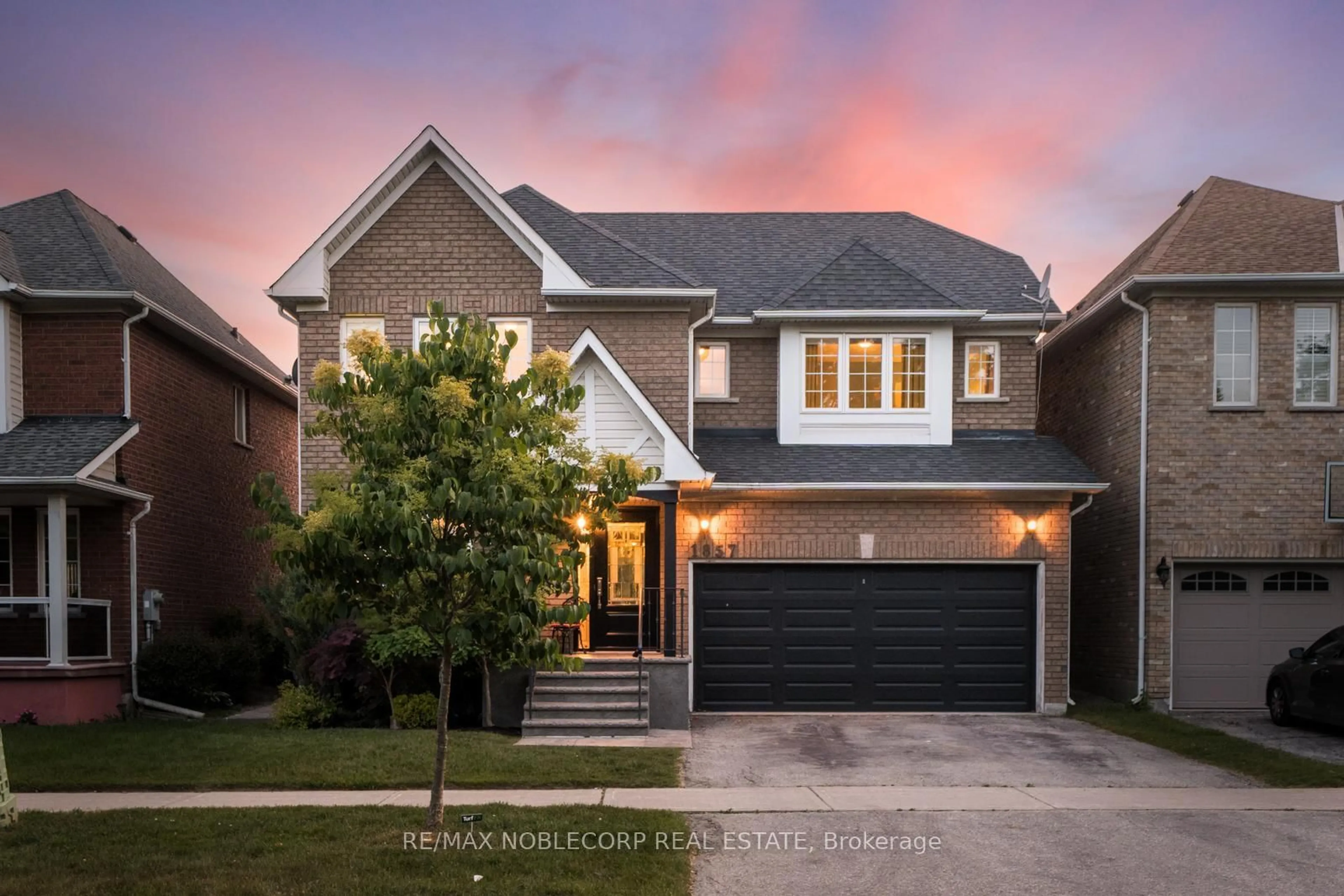 Home with brick exterior material, street for 1857 Samuelson Circ, Mississauga Ontario L5N 7Z2