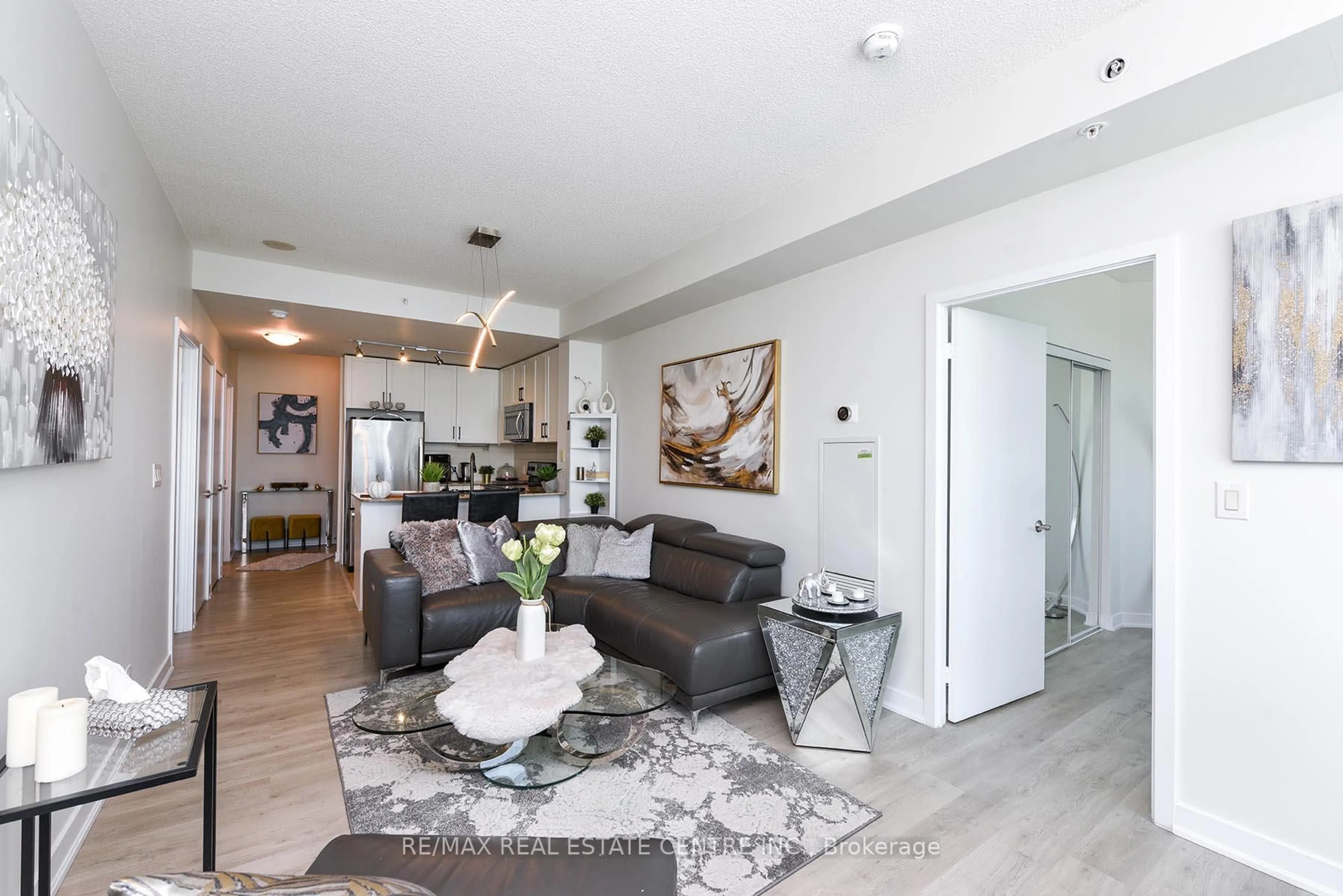 Living room with furniture, unknown for 3985 Grand Park Dr #1412, Mississauga Ontario L5B 0H8