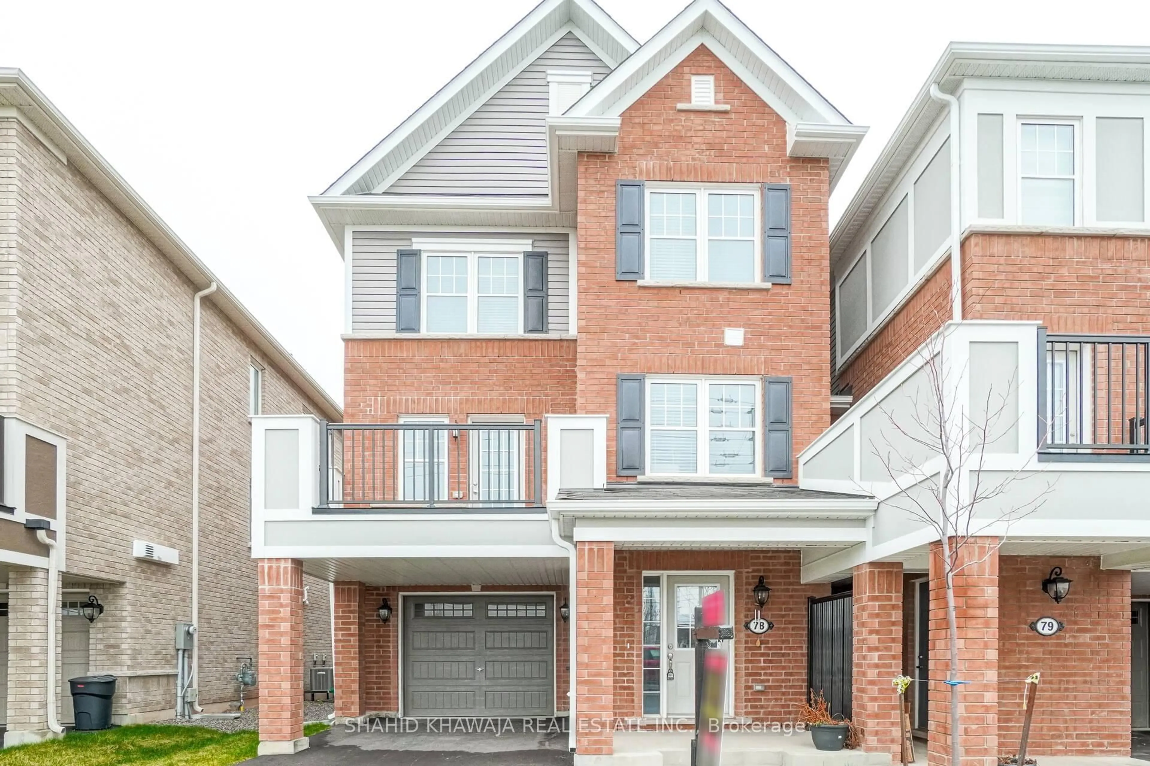 Home with brick exterior material, street for 1222 Rose Way #78, Milton Ontario L9E 1P1