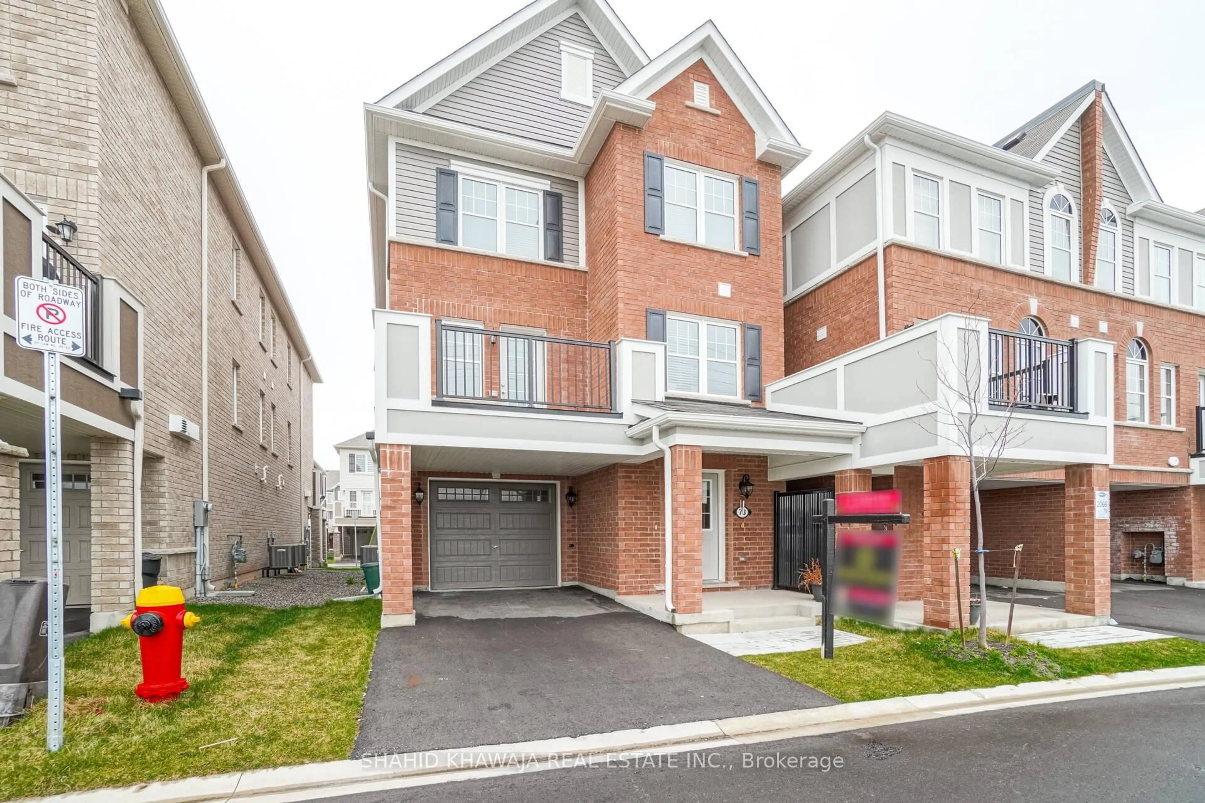 Home with brick exterior material, street for 1222 Rose Way #78, Milton Ontario L9E 1P1