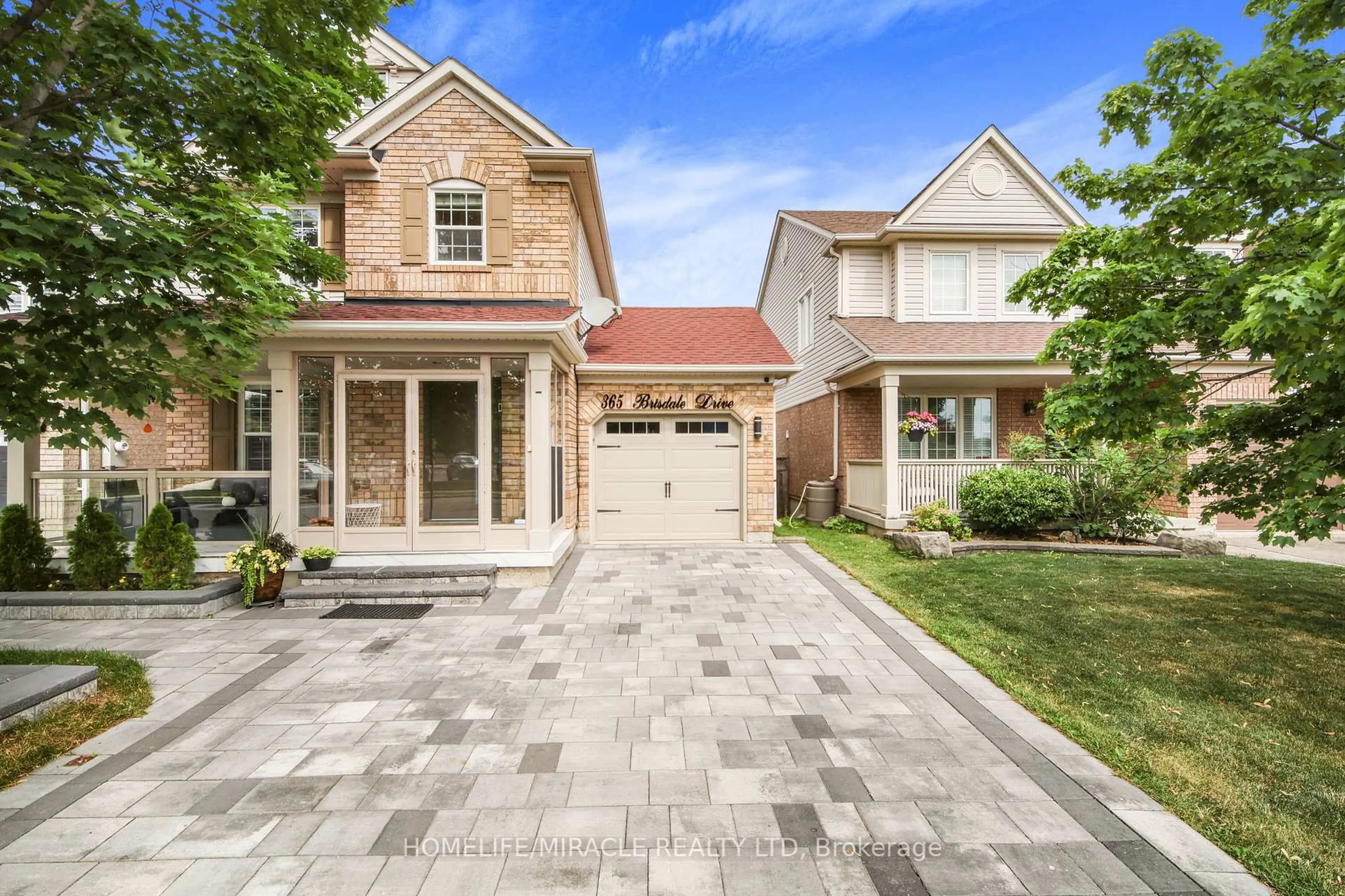 Home with brick exterior material, street for 365 Brisdale Dr, Brampton Ontario L7A 3M6