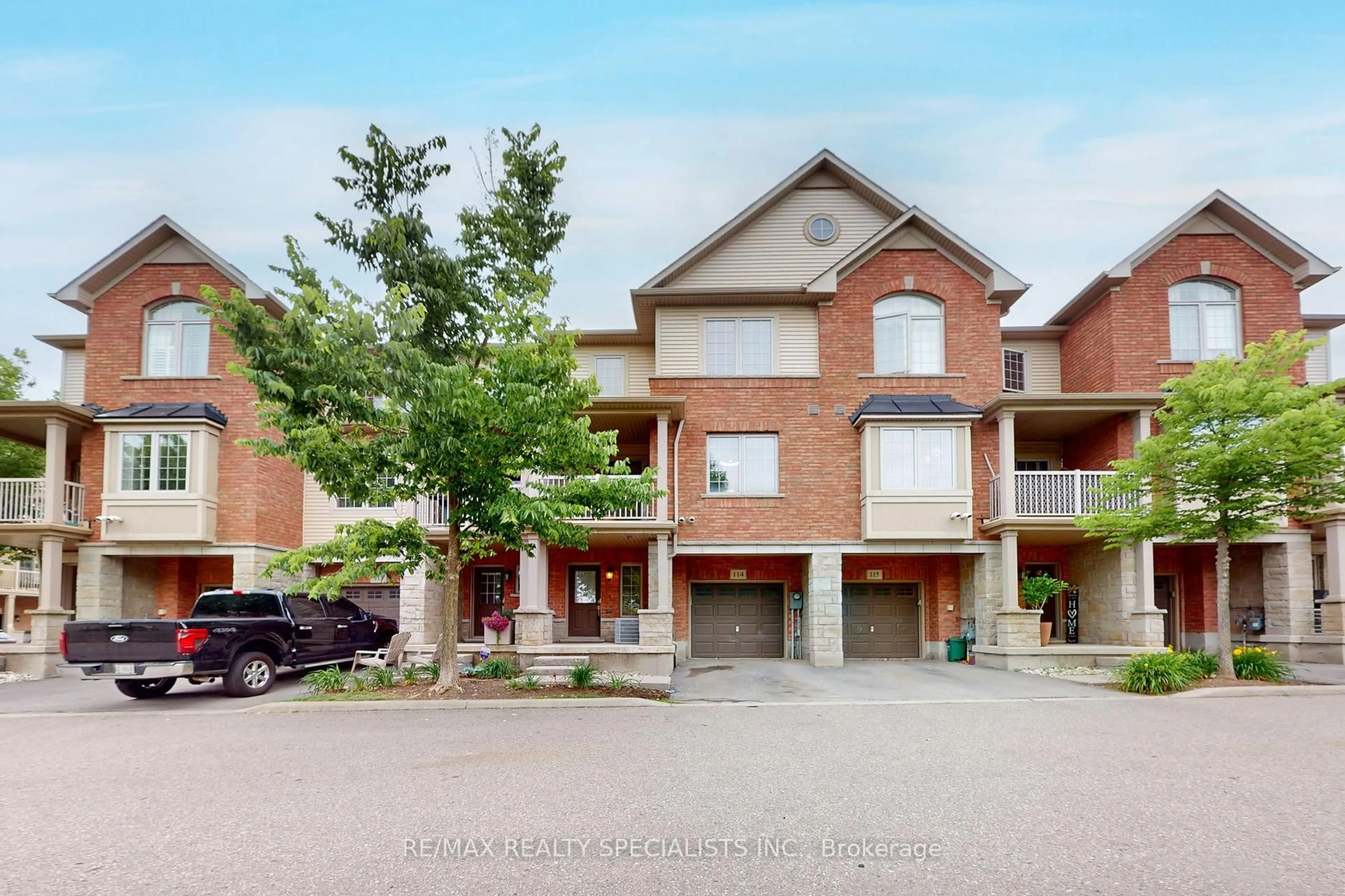 Home with brick exterior material, street for 1401 Plains Rd #114, Burlington Ontario L7R 0C2