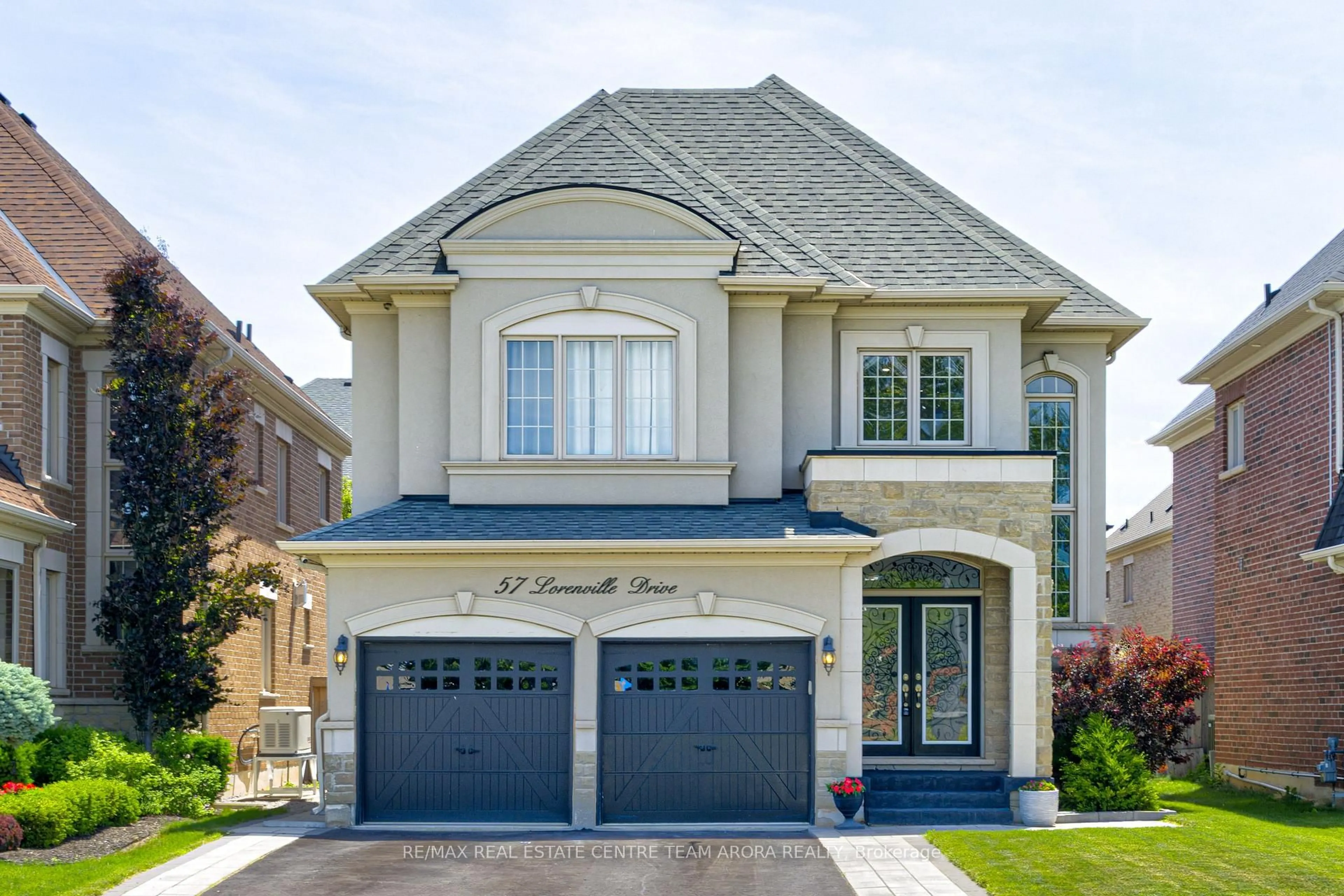 Home with brick exterior material, street for 57 Lorenville Dr, Brampton Ontario L6X 0E4