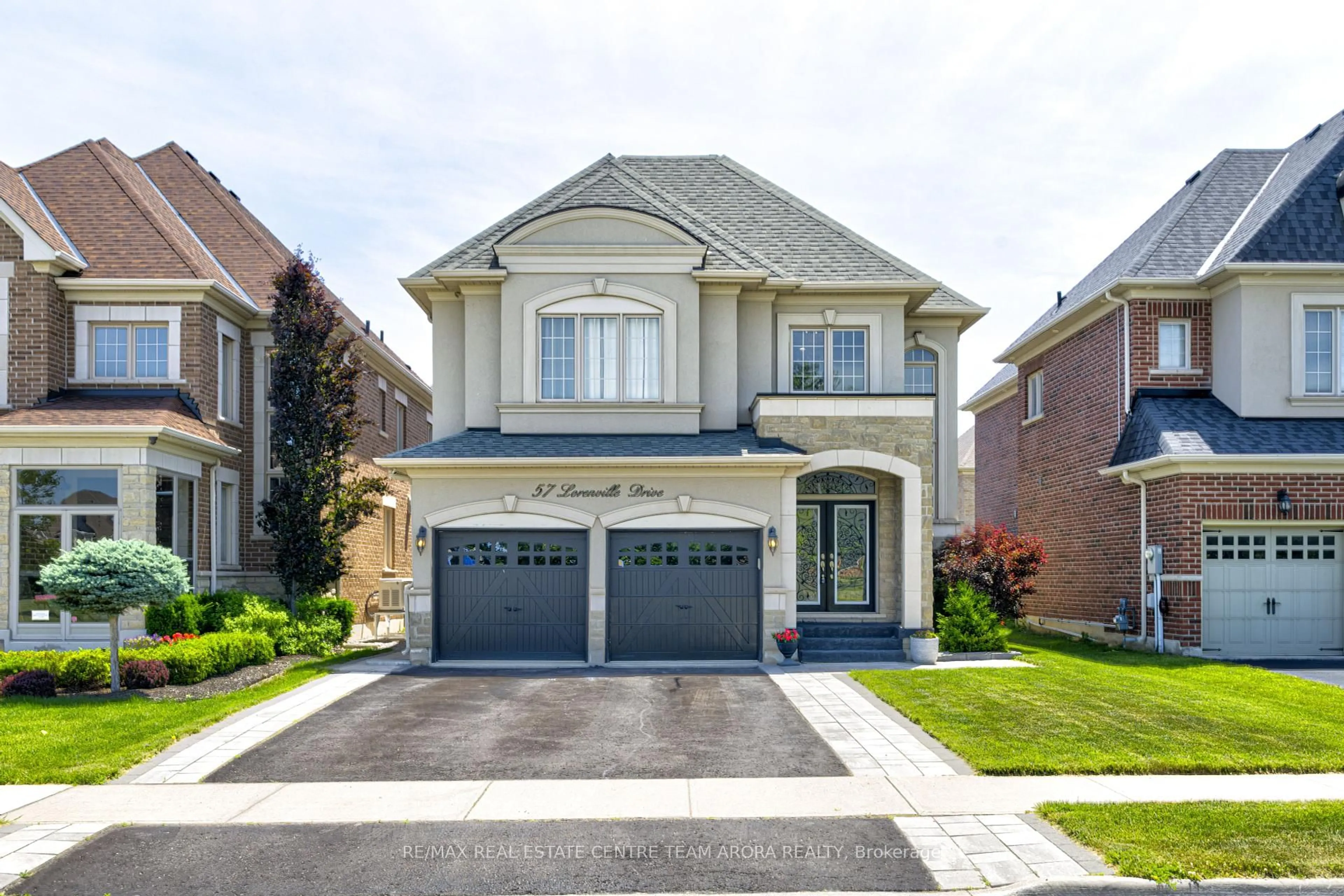 Home with brick exterior material, street for 57 Lorenville Dr, Brampton Ontario L6X 0E4