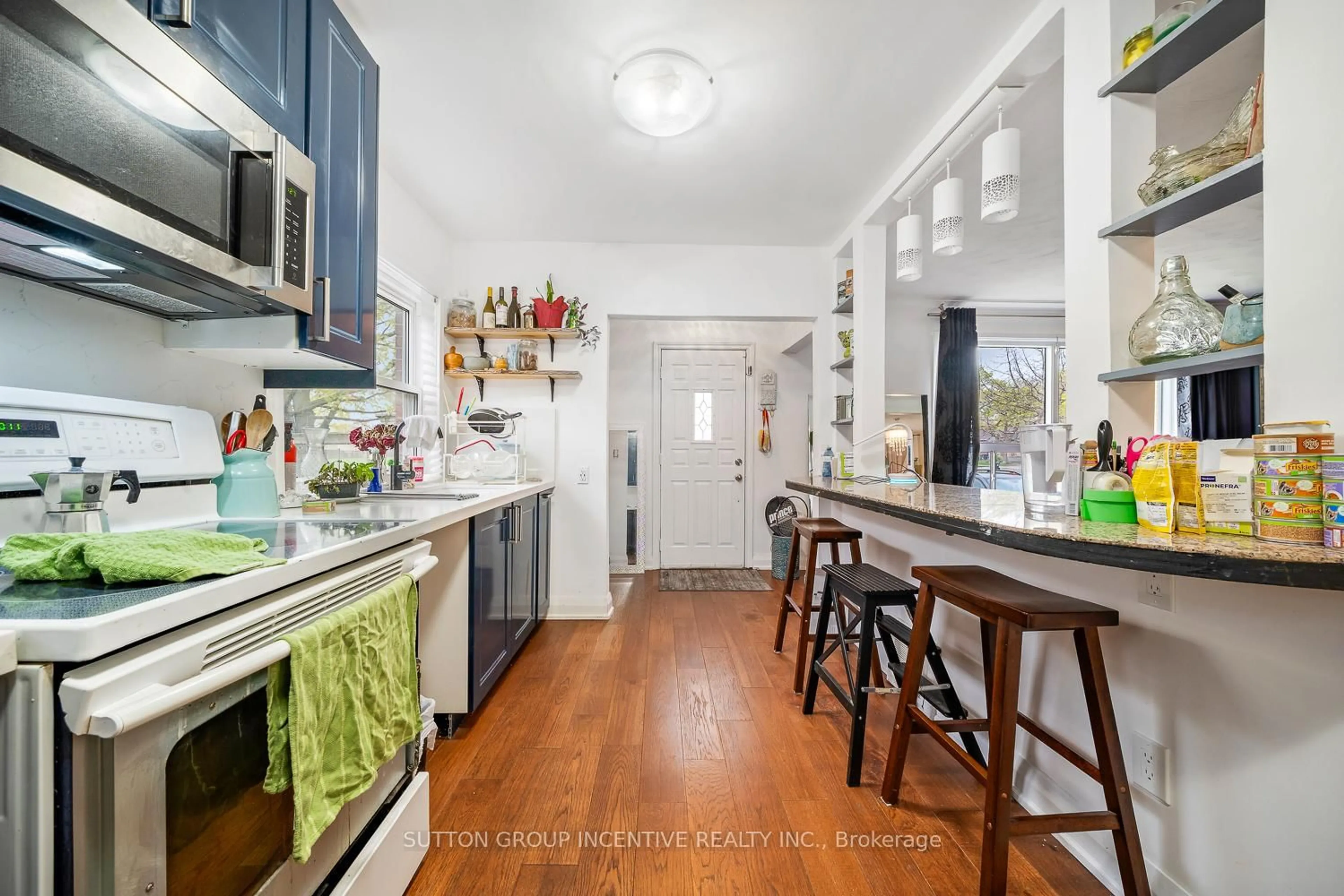 Open concept kitchen, ceramic/tile floor for 65 Barrhead Cres, Toronto Ontario M9W 3Z8