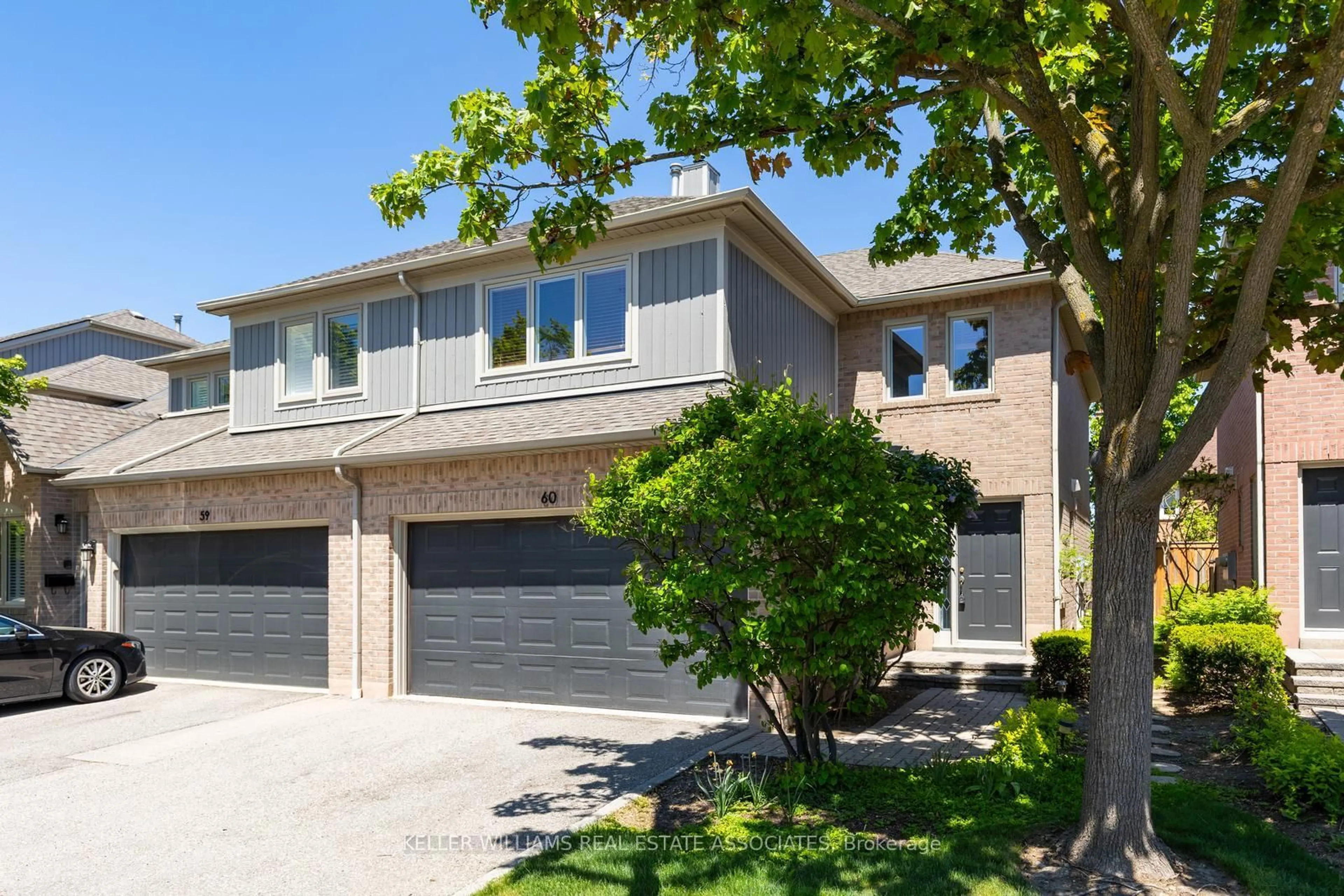 Home with brick exterior material, street for 5480 Glen Erin Dr #60, Mississauga Ontario L5M 5R3