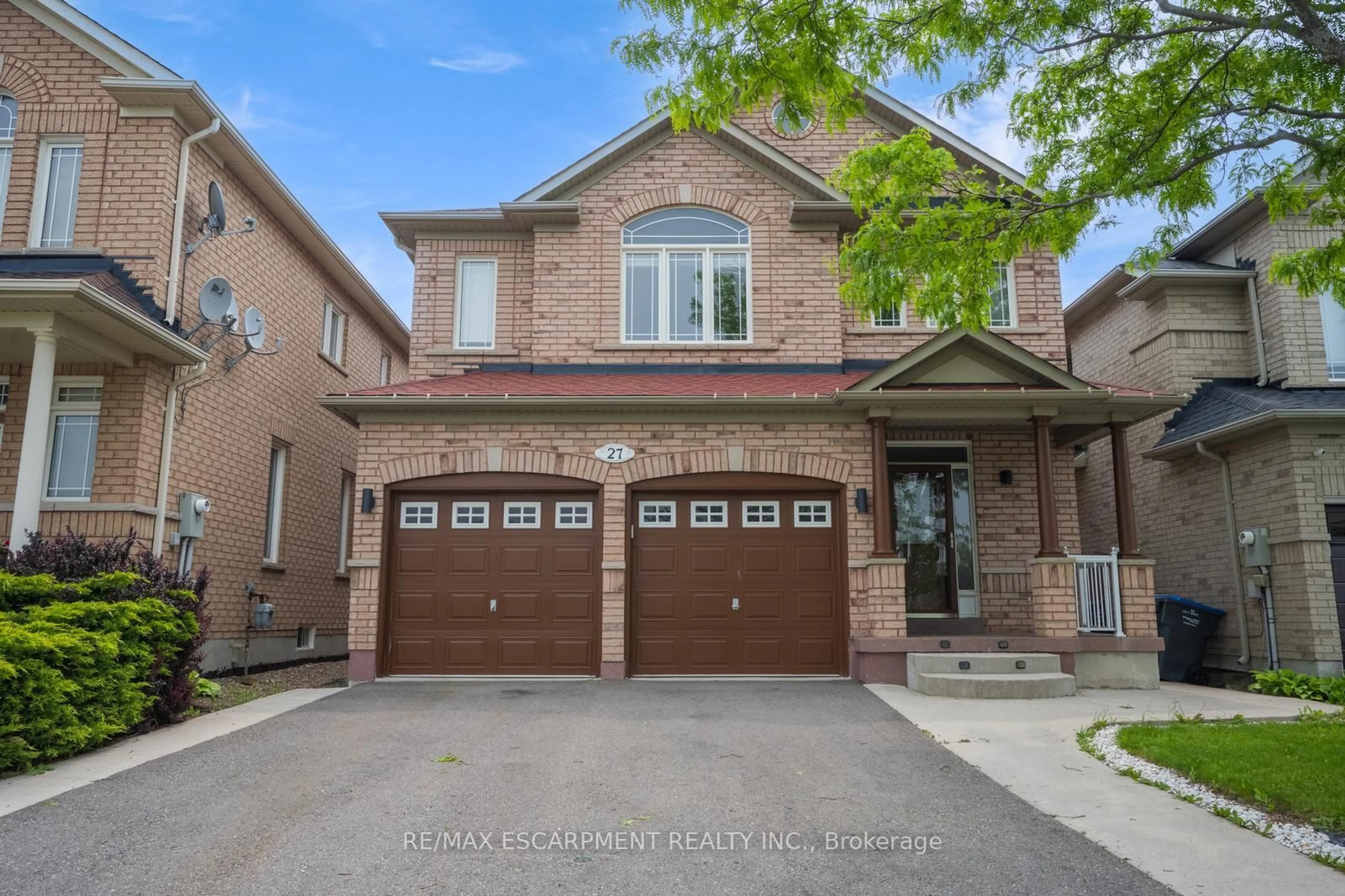 Home with brick exterior material, street for 27 Putnam Dr, Brampton Ontario L7A 3S9