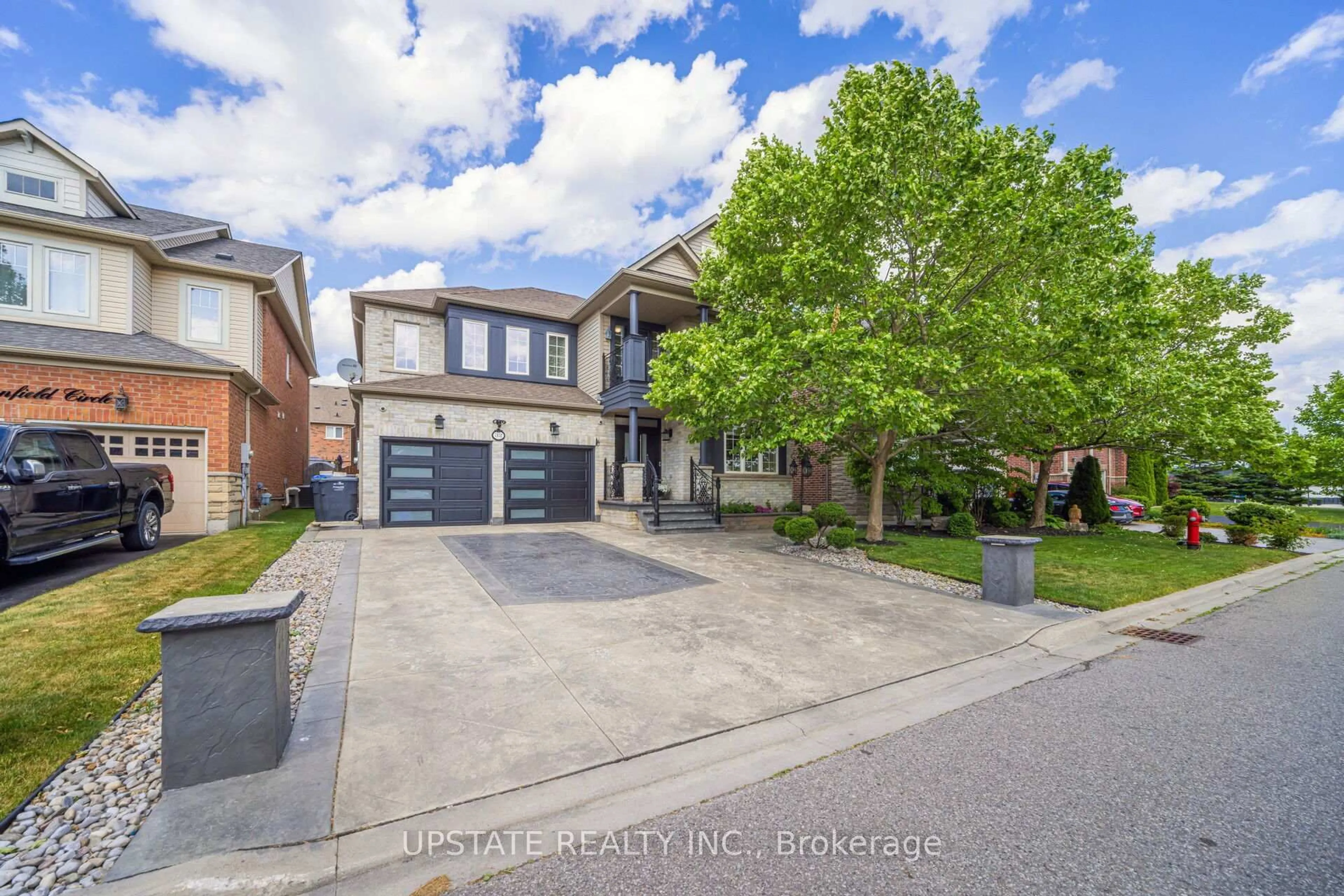 Home with brick exterior material, street for 32 Cottonfield Circ, Caledon Ontario L7C 3M9