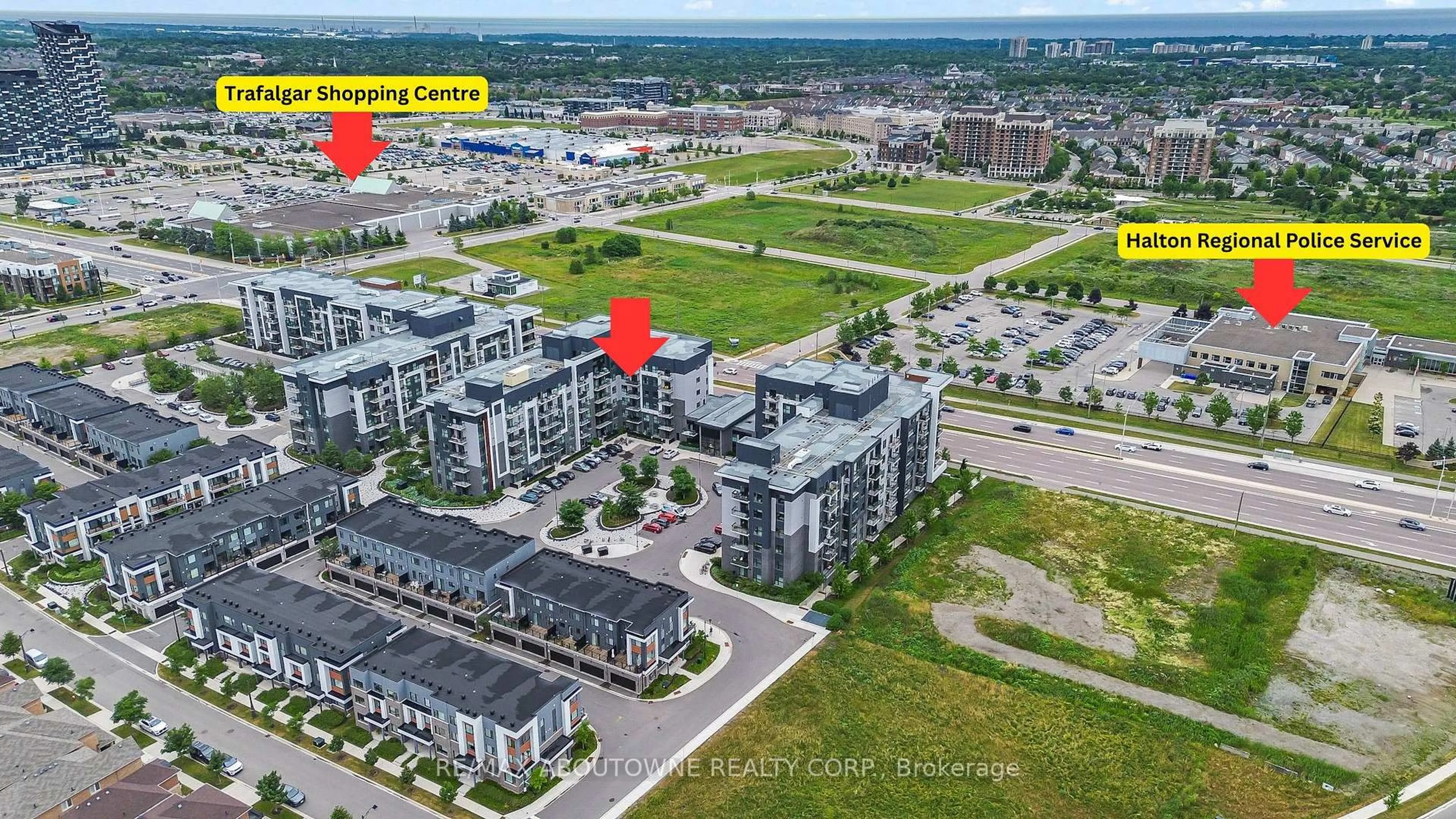 A pic from outside/outdoor area/front of a property/back of a property/a pic from drone, city buildings view from balcony for 102 Grovewood Common #121, Oakville Ontario L6H 0X2