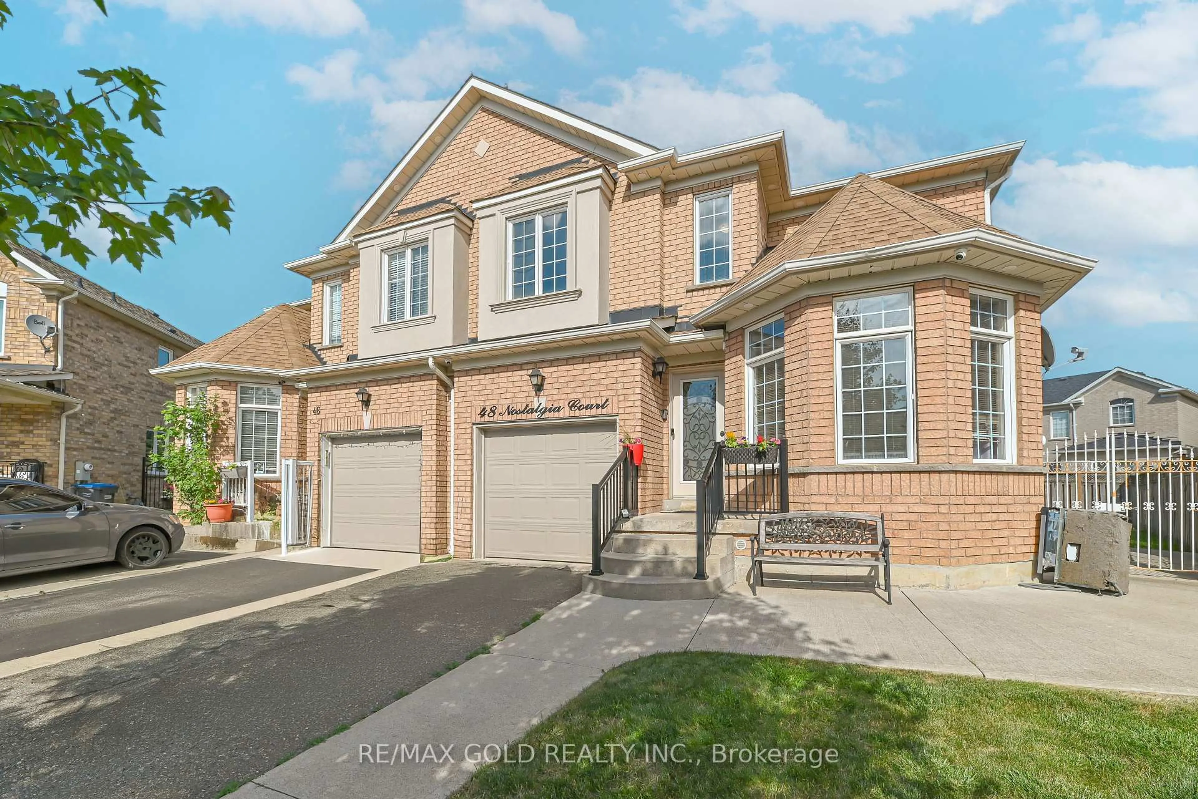 Home with brick exterior material, street for 48 Nostalgia Crt, Brampton Ontario L6X 5C6