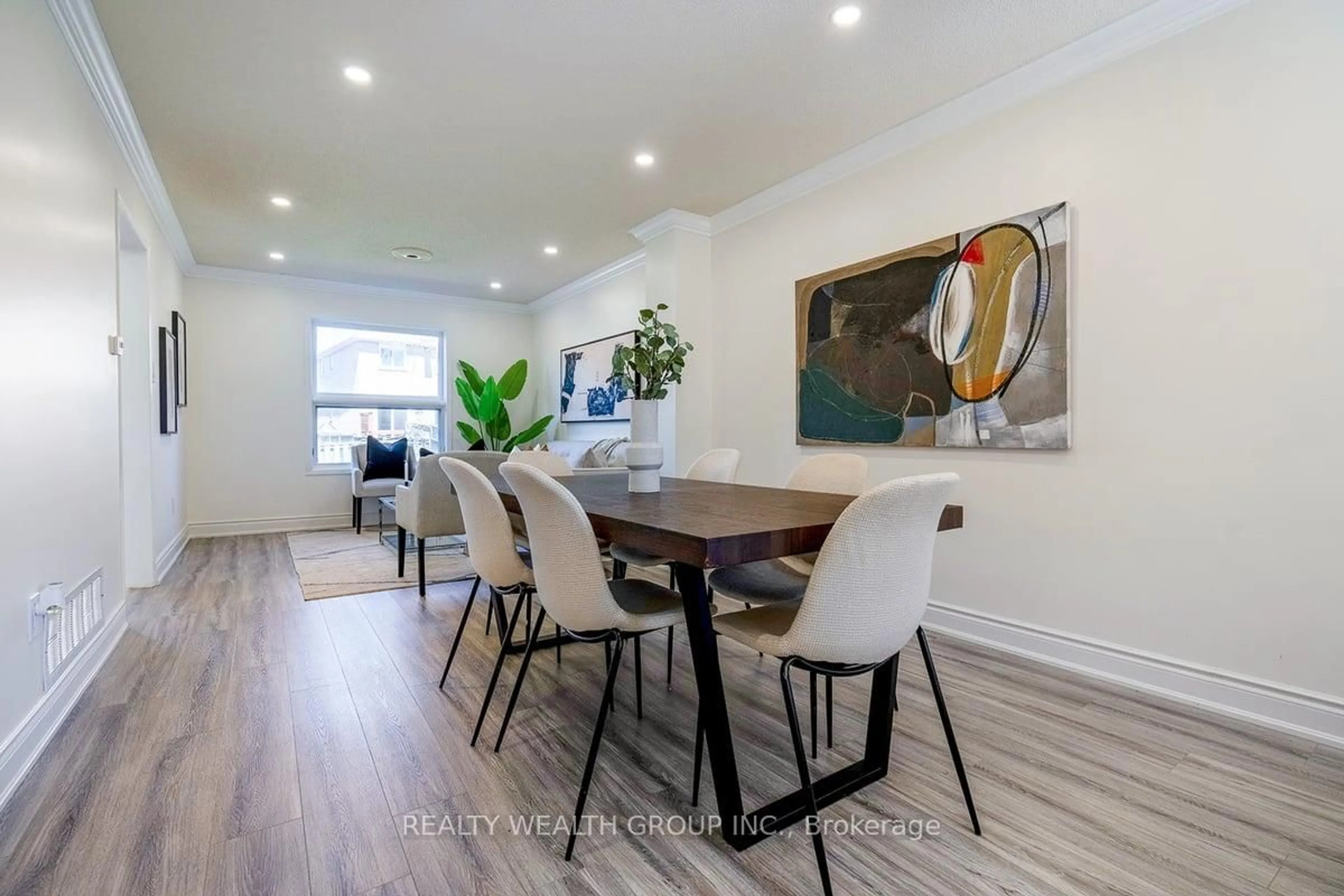 Dining room, wood/laminate floor for 1077 Windsor Hill Blvd, Mississauga Ontario L5V 1P4