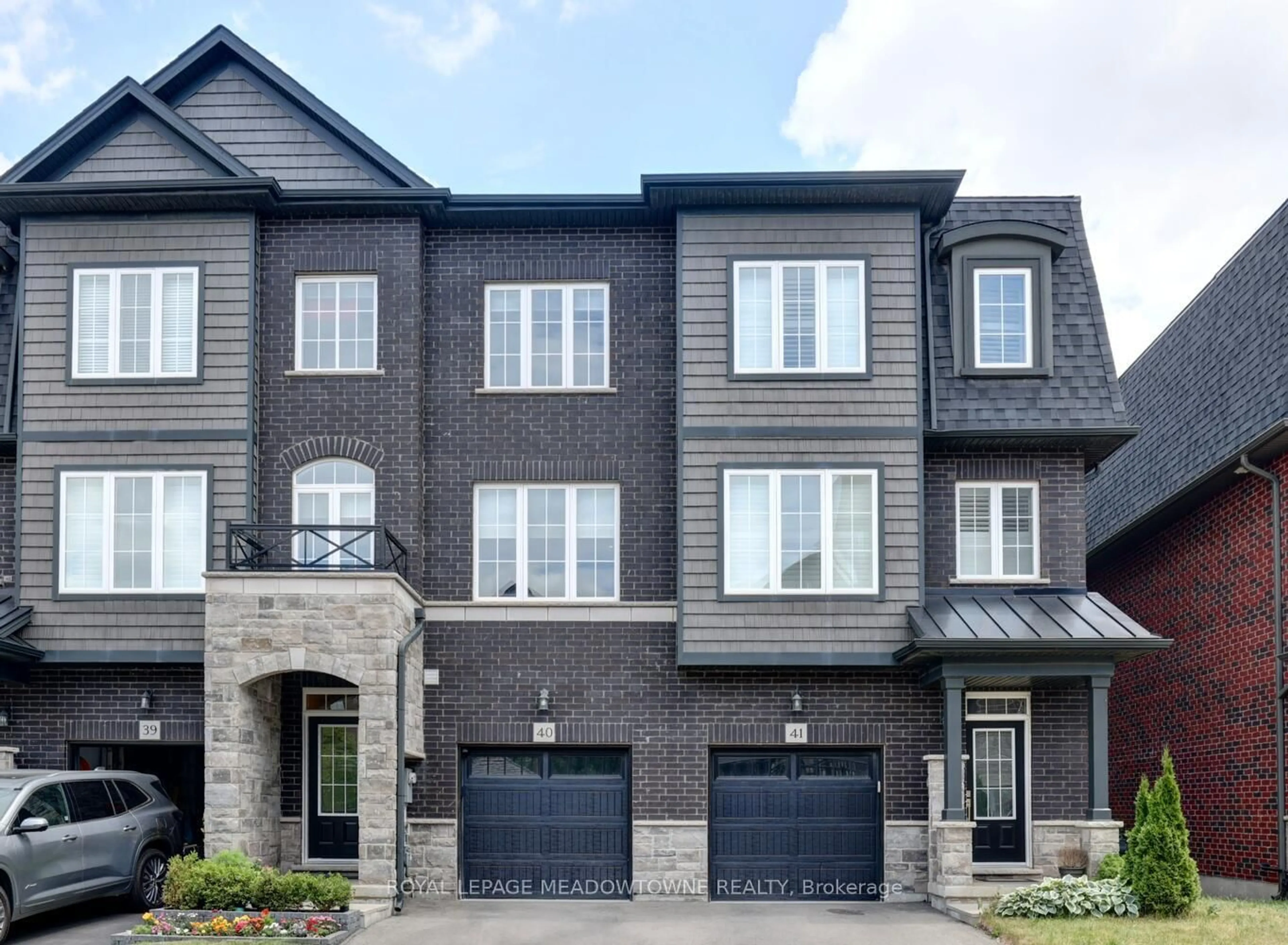 Home with brick exterior material, street for 445 Ontario St #40, Milton Ontario L9T 9K3