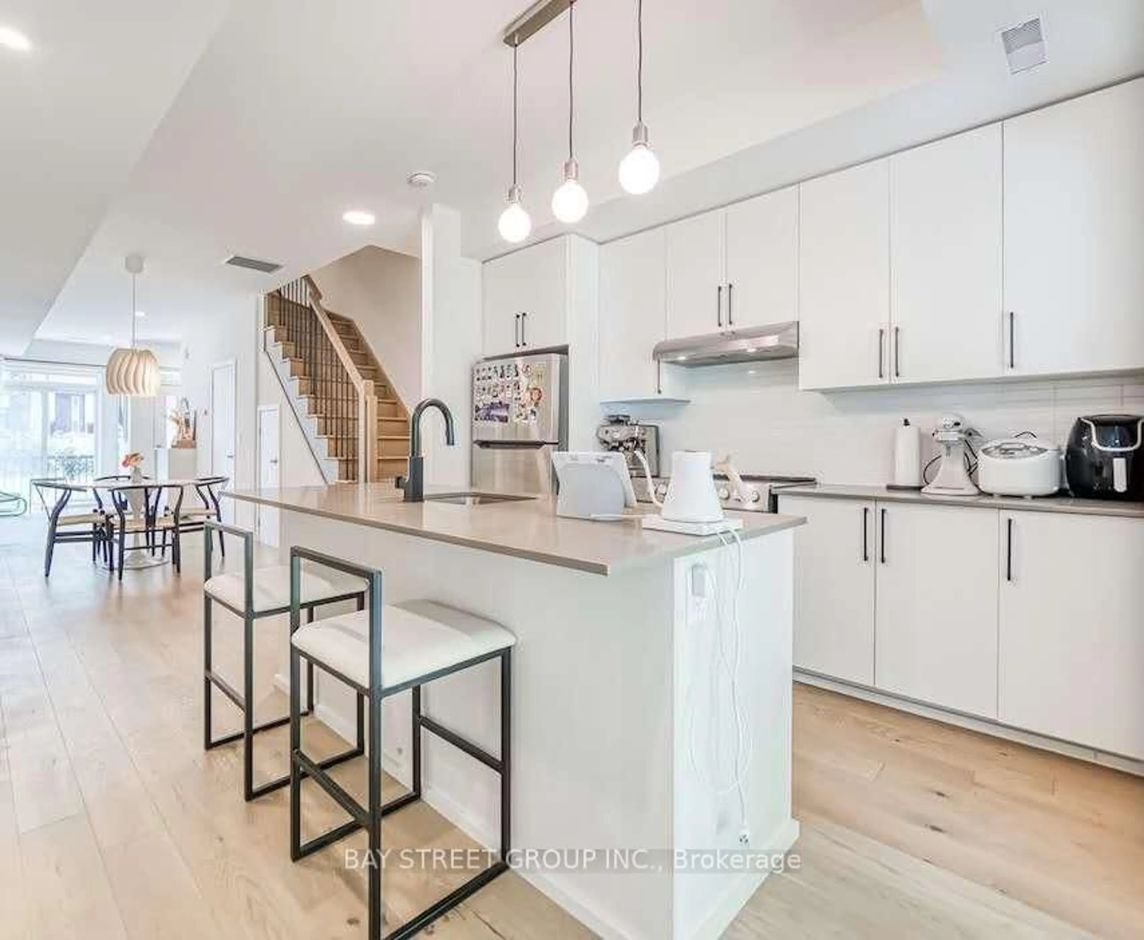 Open concept kitchen, unknown for 110 Canon Jackson Dr #104, Toronto Ontario M6M 0C1