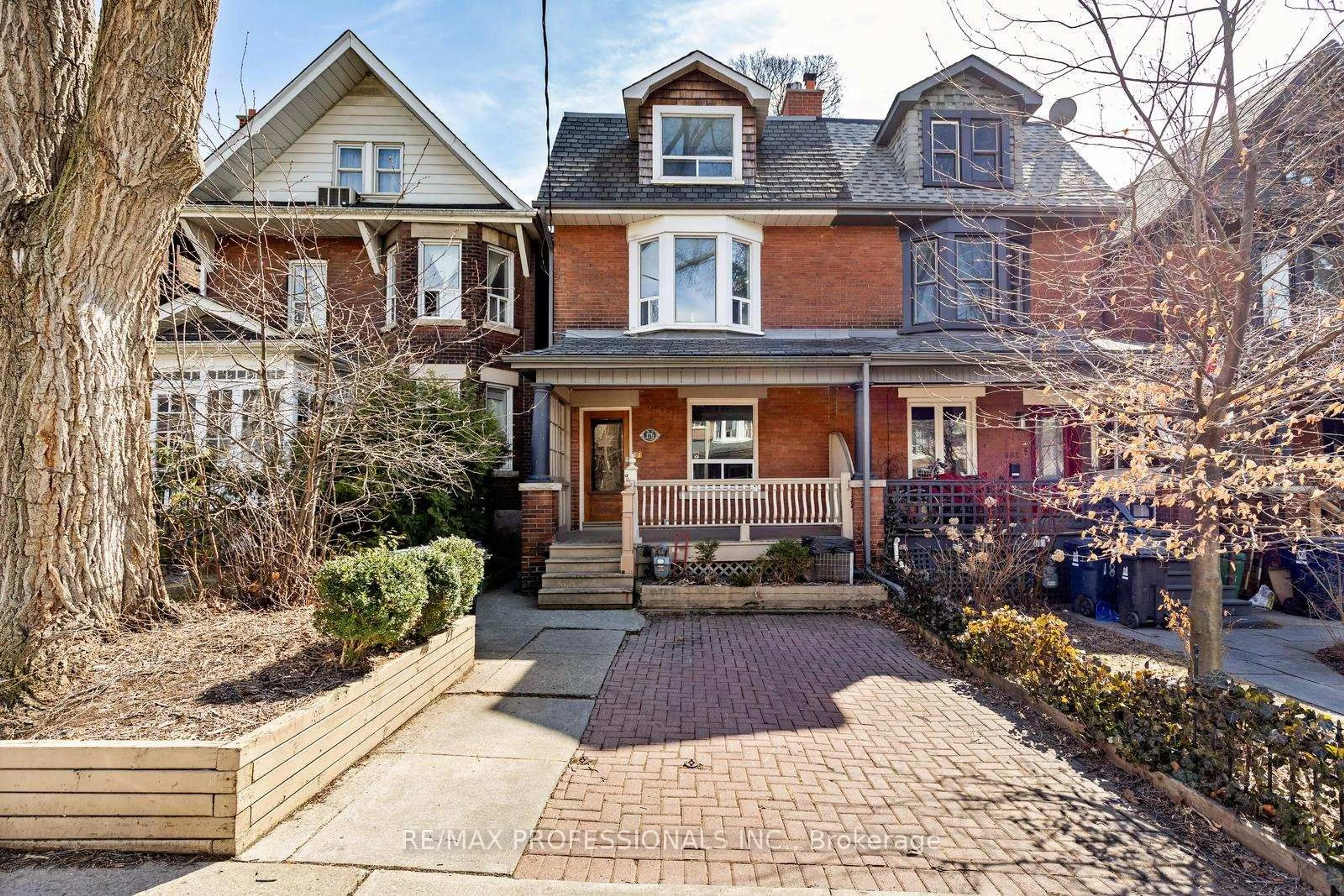 Home with brick exterior material, street for 179 Marion St, Toronto Ontario M6R 1E9