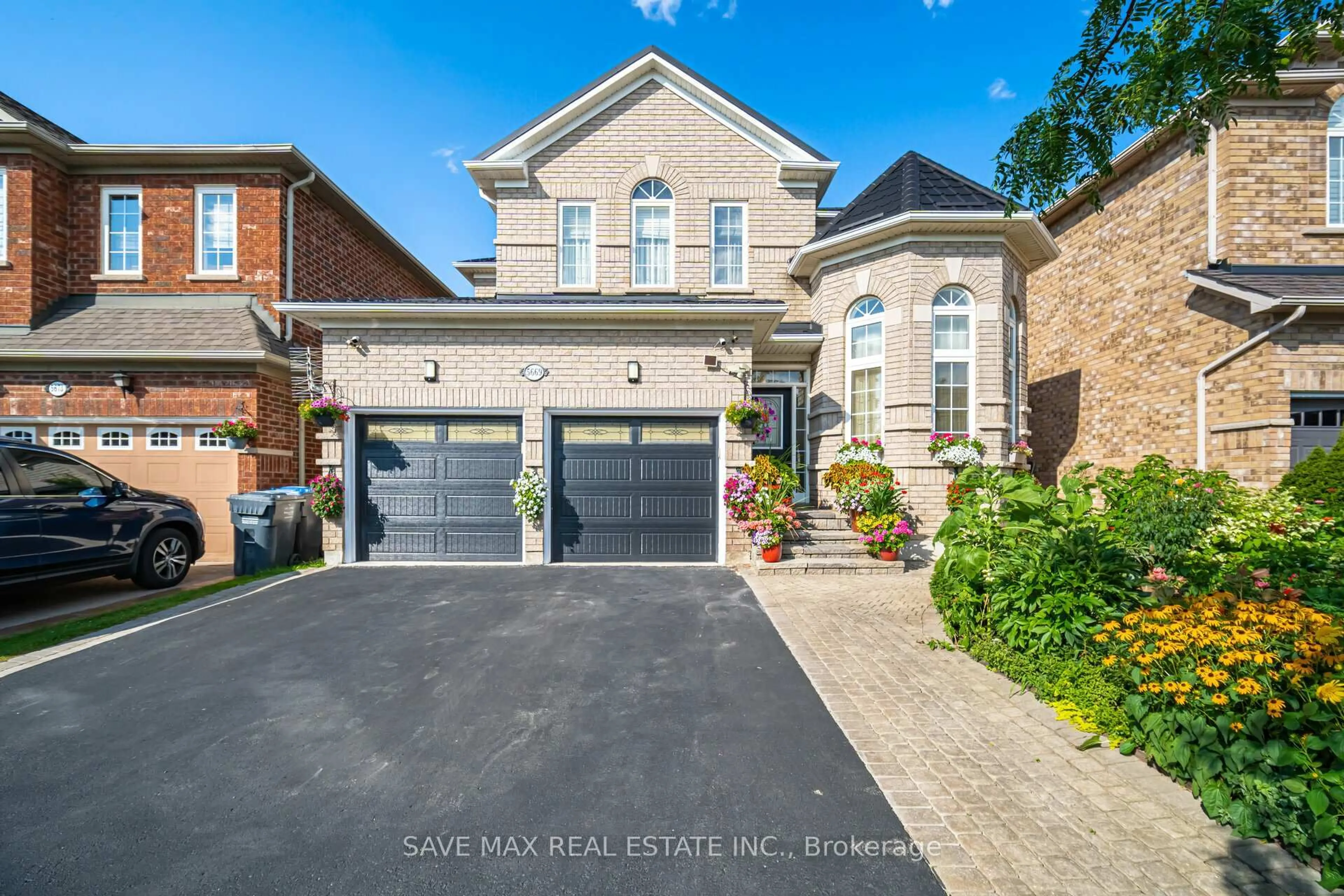 Home with brick exterior material, street for 5669 Freshwater Dr, Mississauga Ontario L5M 7G1
