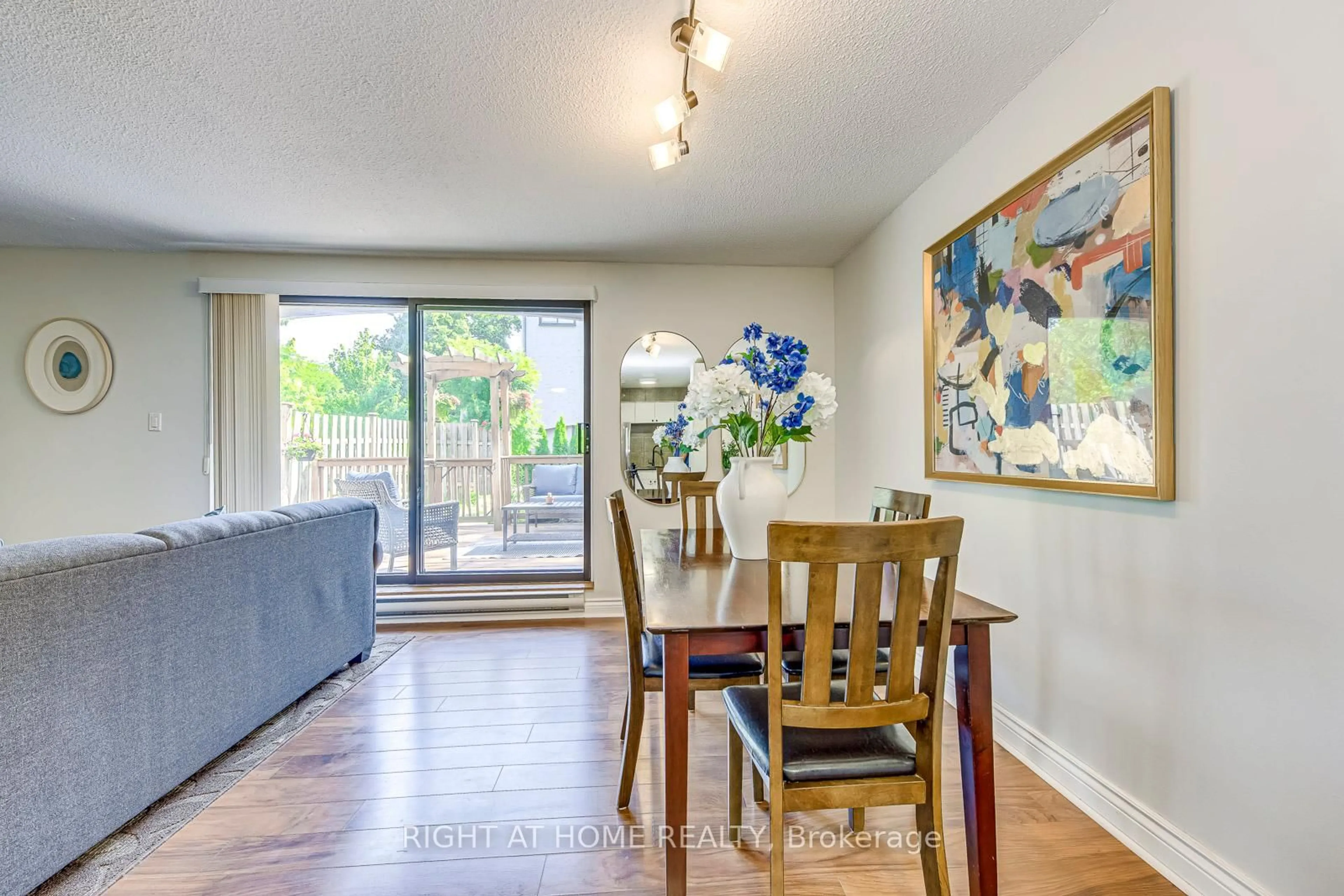 Dining room, wood/laminate floor for 1008 Falgarwood Dr #02, Oakville Ontario L6H 2P5