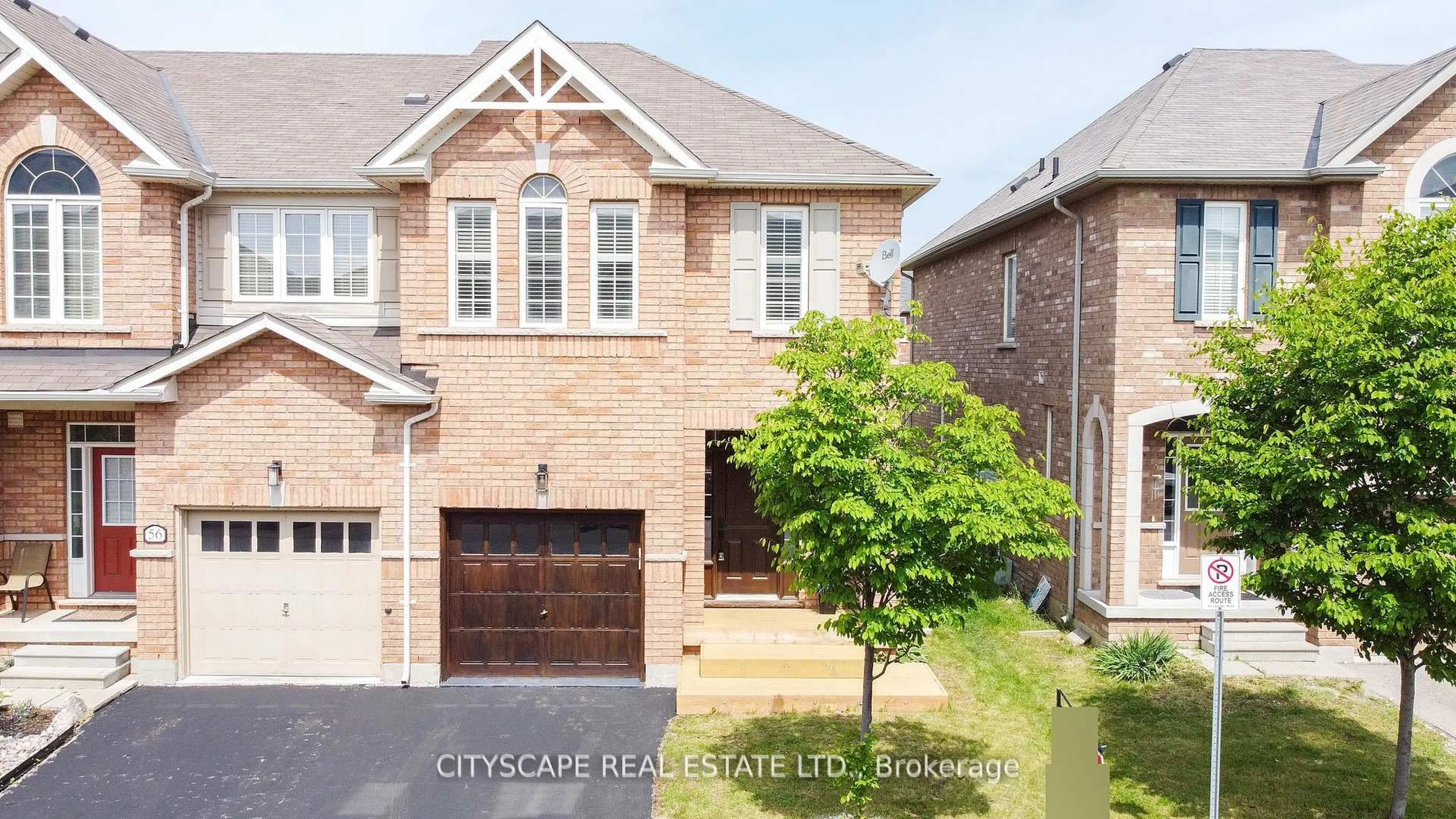 Home with brick exterior material, street for 651 Farmstead Dr #57, Milton Ontario L9T 7W2