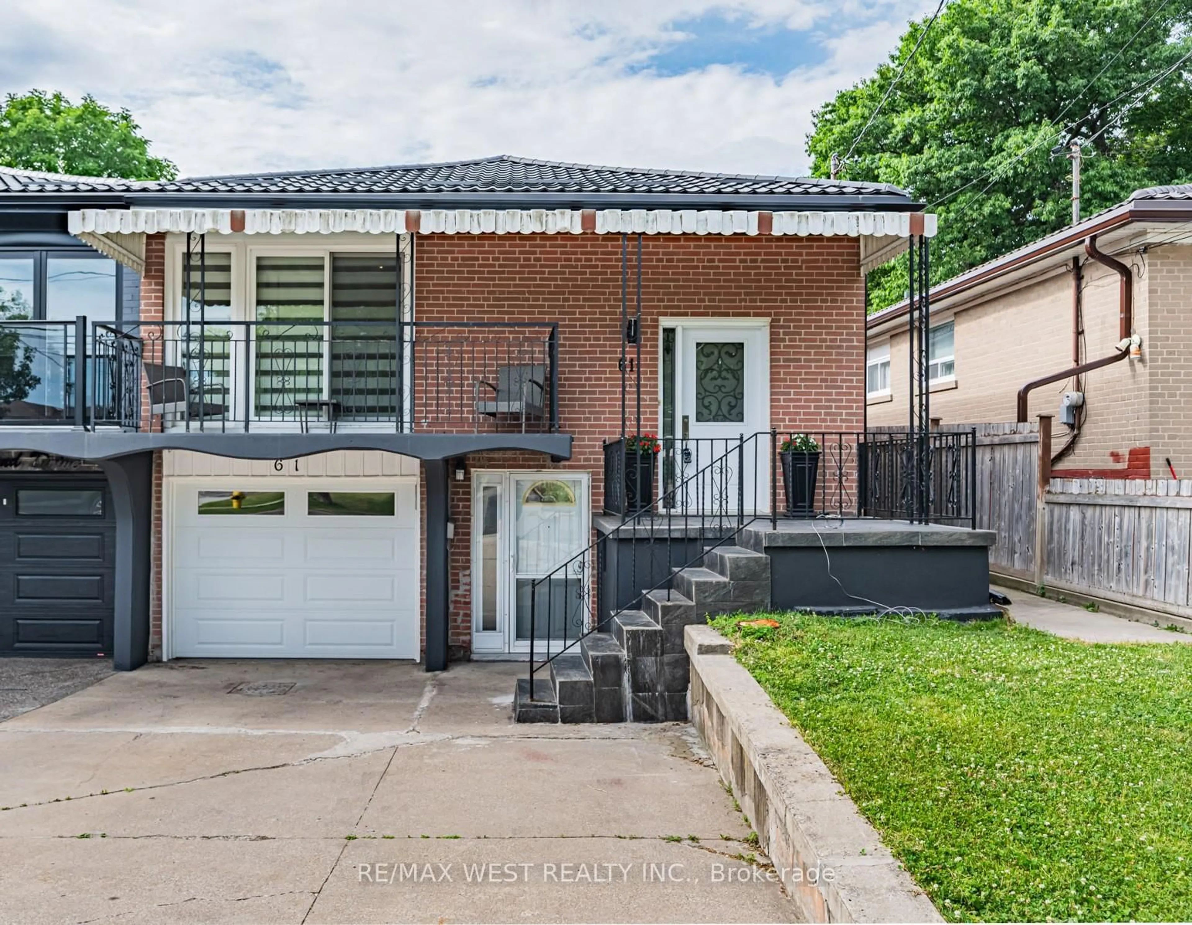 Home with brick exterior material, street for 61 Husband Dr, Toronto Ontario M9L 1J8