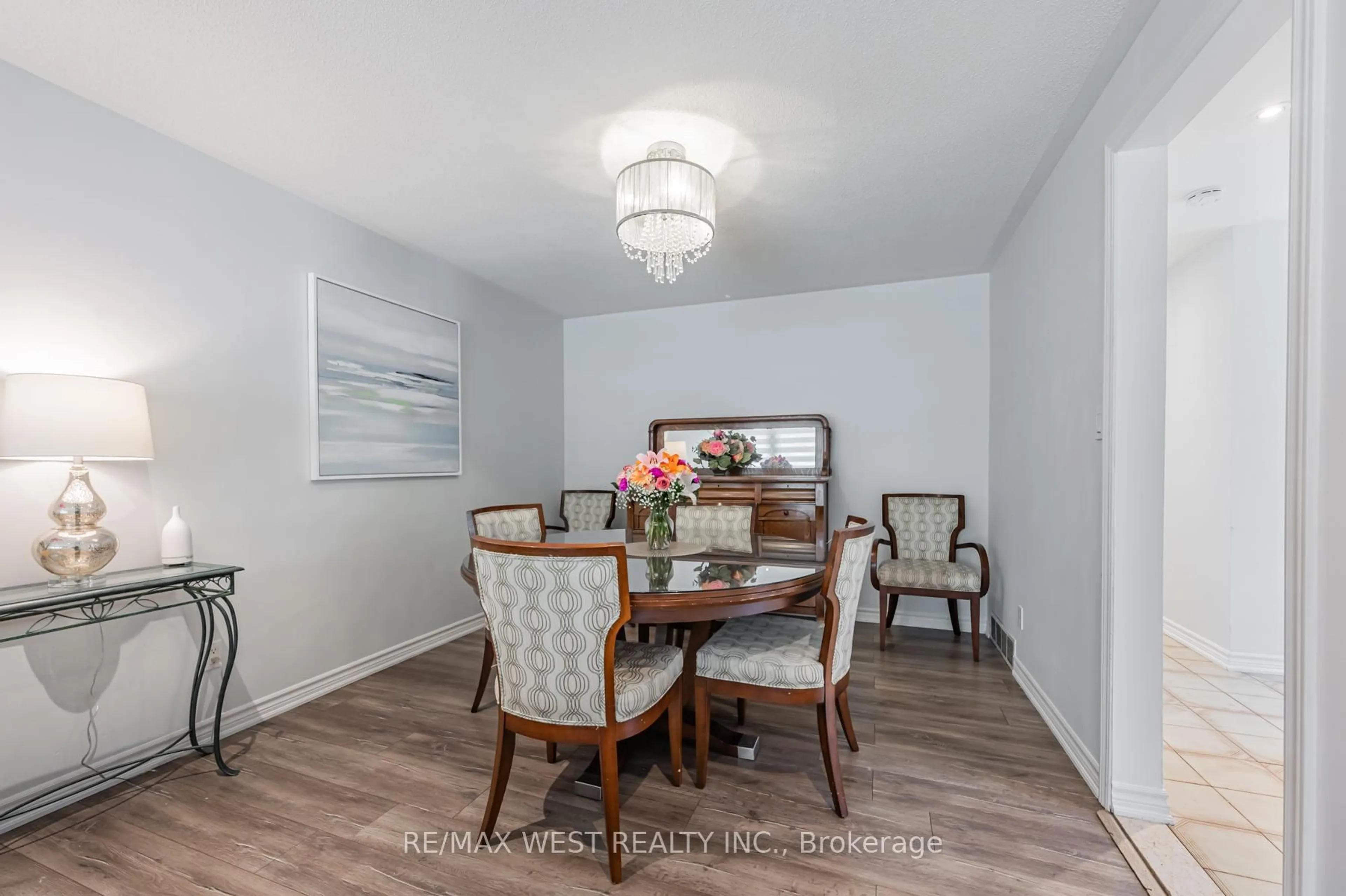 Dining room, wood/laminate floor for 61 Husband Dr, Toronto Ontario M9L 1J8
