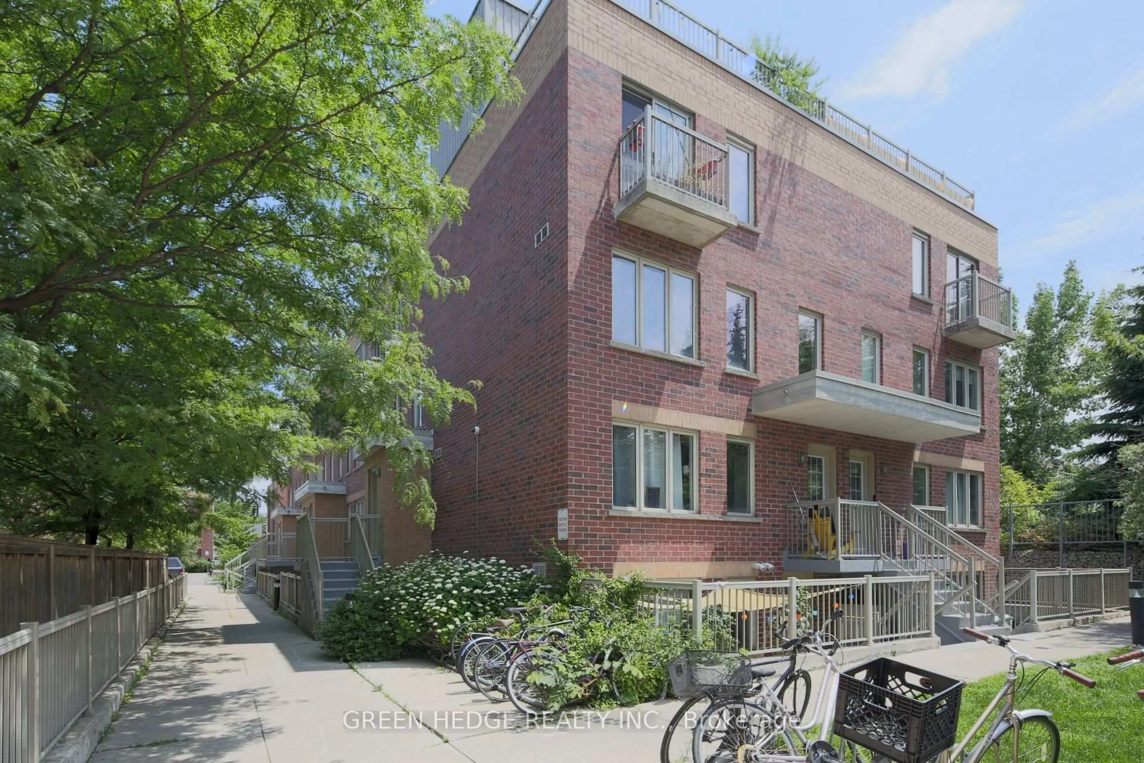 Home with brick exterior material, street for 20 Elsie Lane #218, Toronto Ontario M6P 3N9
