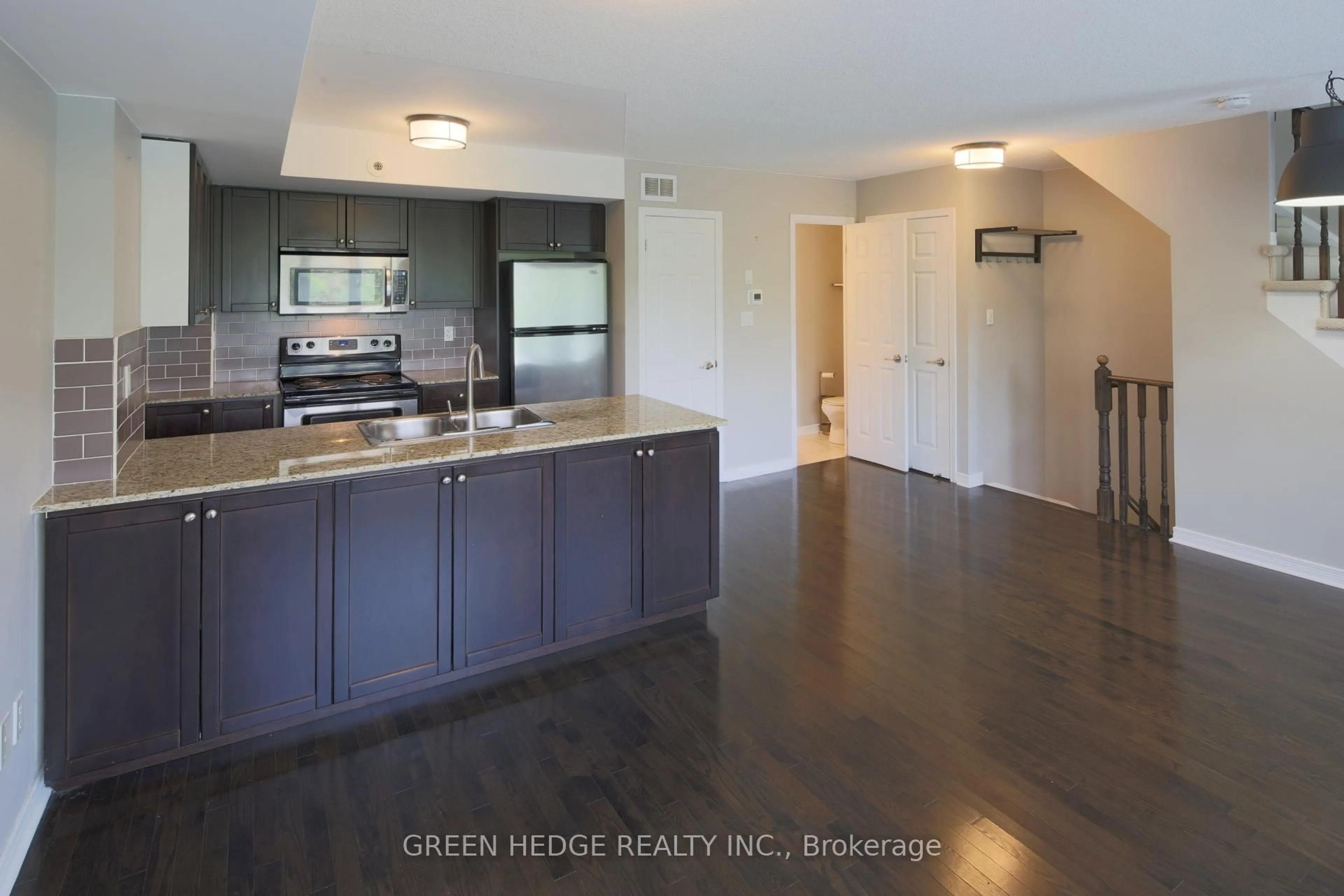 Open concept kitchen, unknown for 20 Elsie Lane #218, Toronto Ontario M6P 3N9
