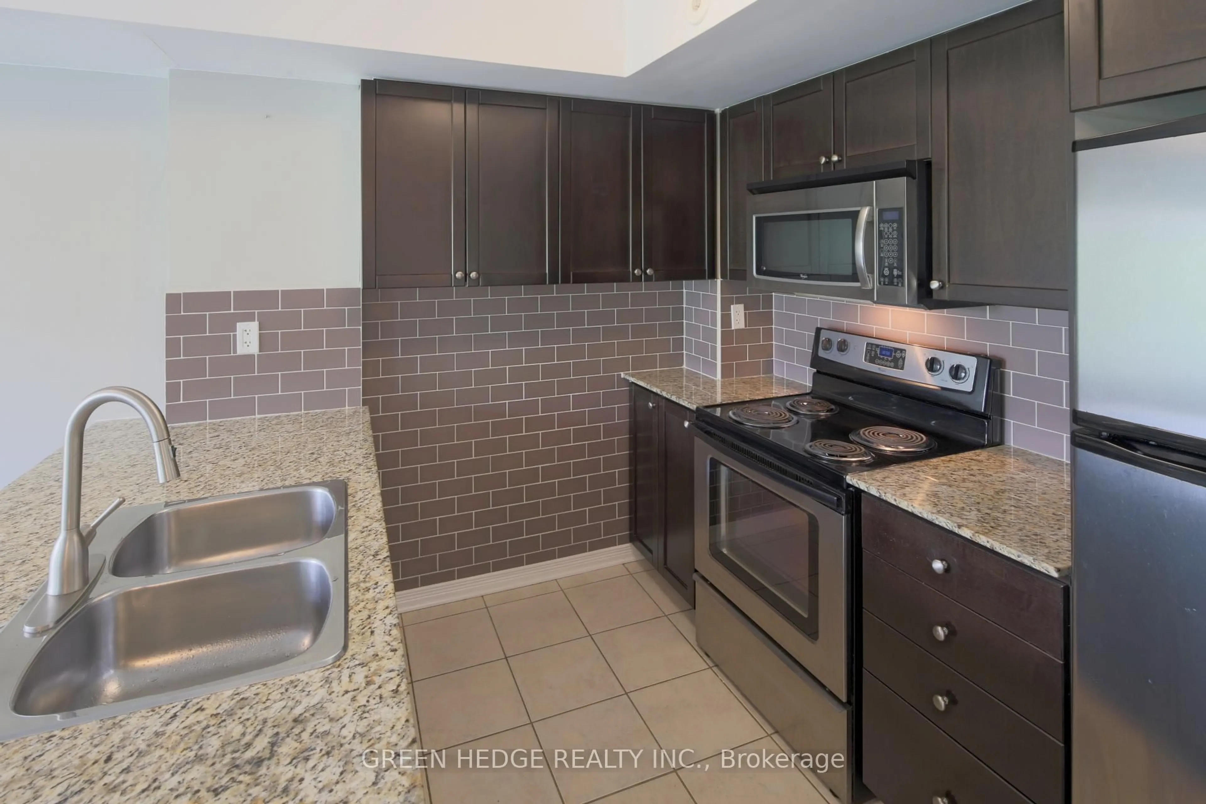 Standard kitchen, ceramic/tile floor for 20 Elsie Lane #218, Toronto Ontario M6P 3N9