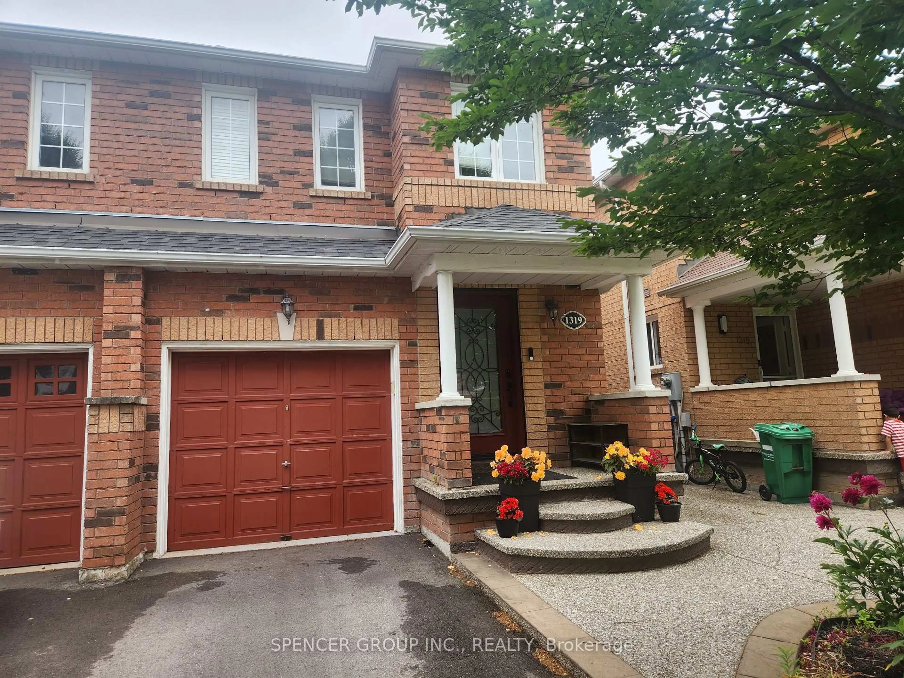 Home with brick exterior material, street for 1319 Inuit Tr, Mississauga Ontario L5N 7R4