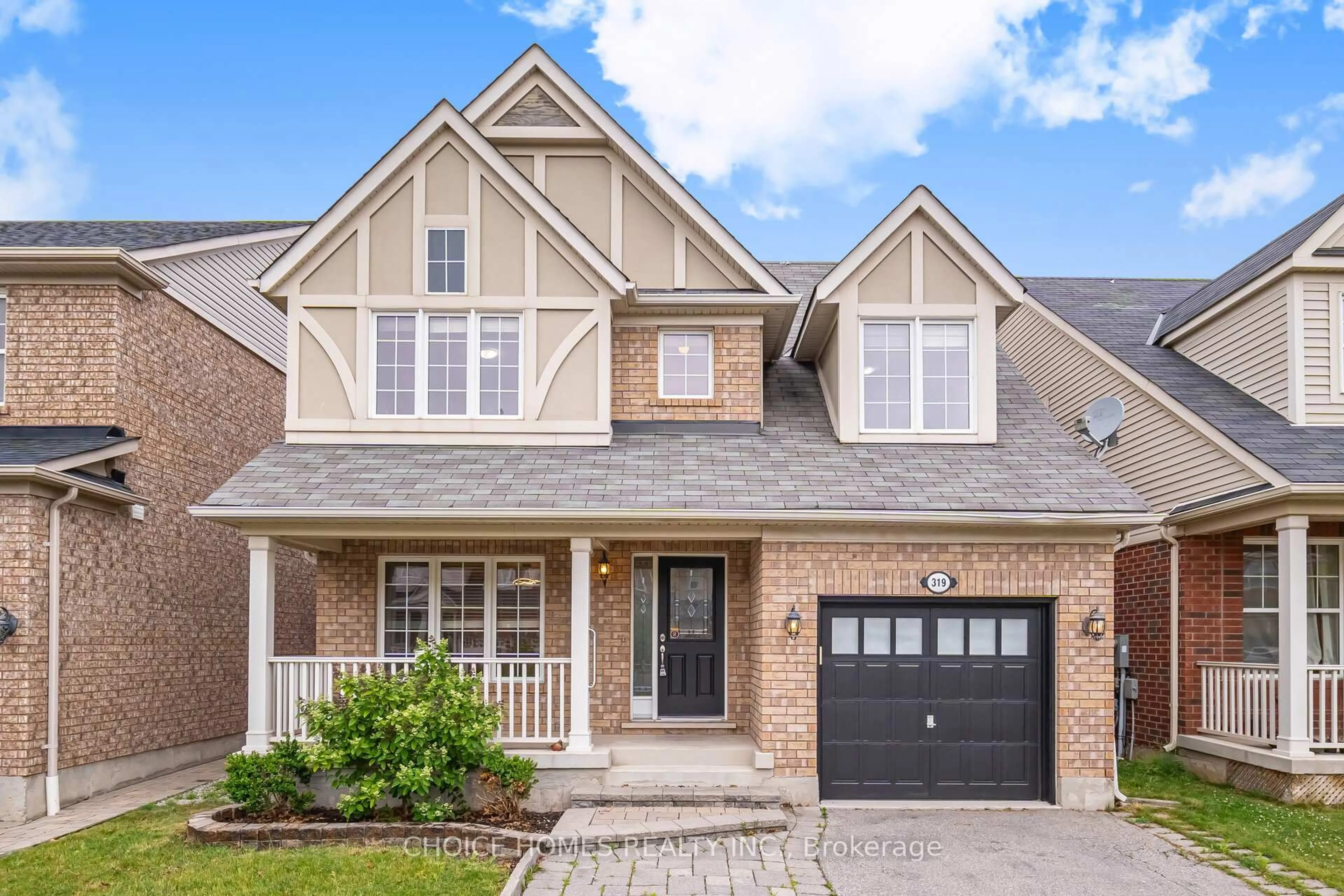 Home with brick exterior material, street for 319 Mcdougall Crossing, Milton Ontario L9T 0N5