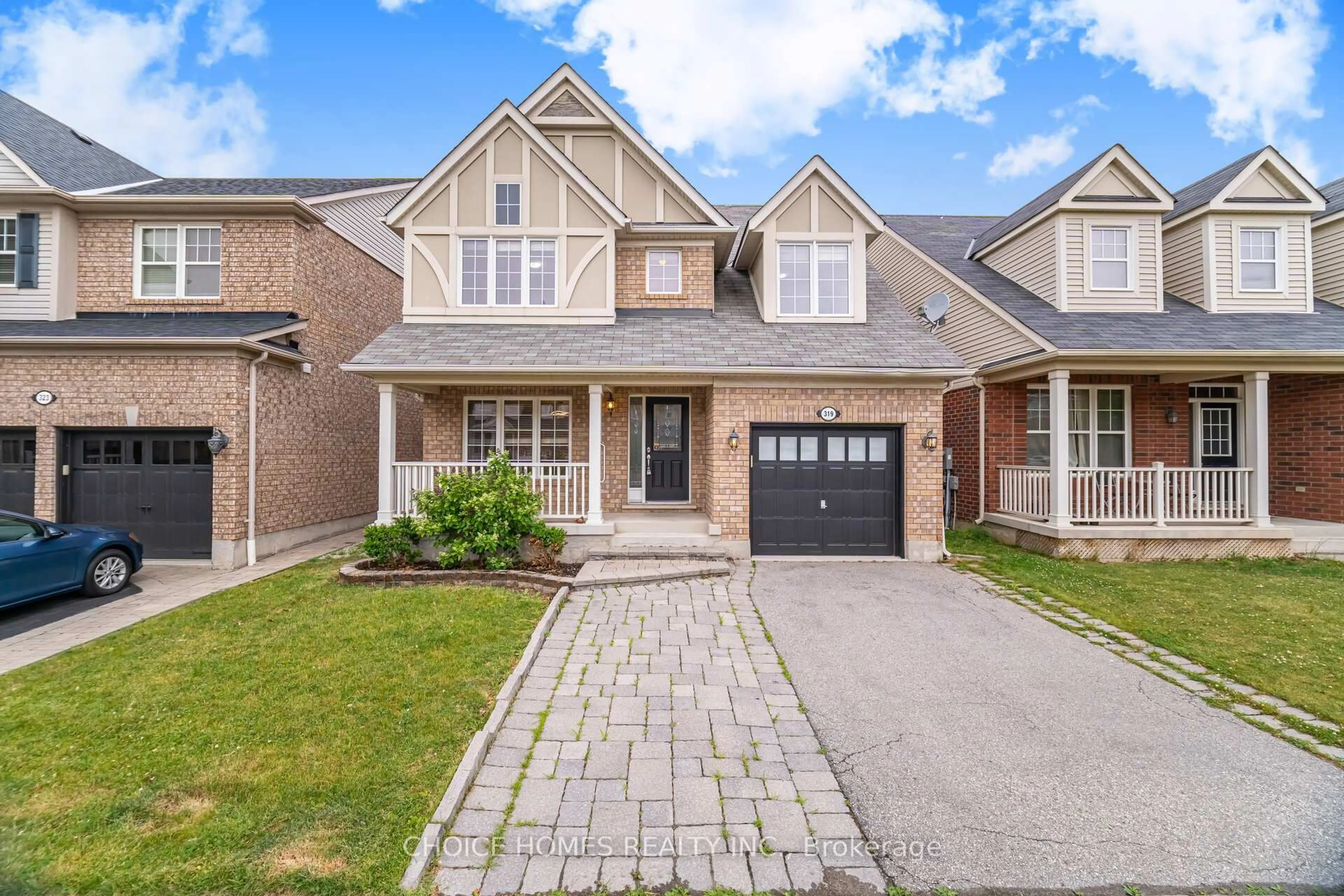 Home with brick exterior material, street for 319 Mcdougall Crossing, Milton Ontario L9T 0N5