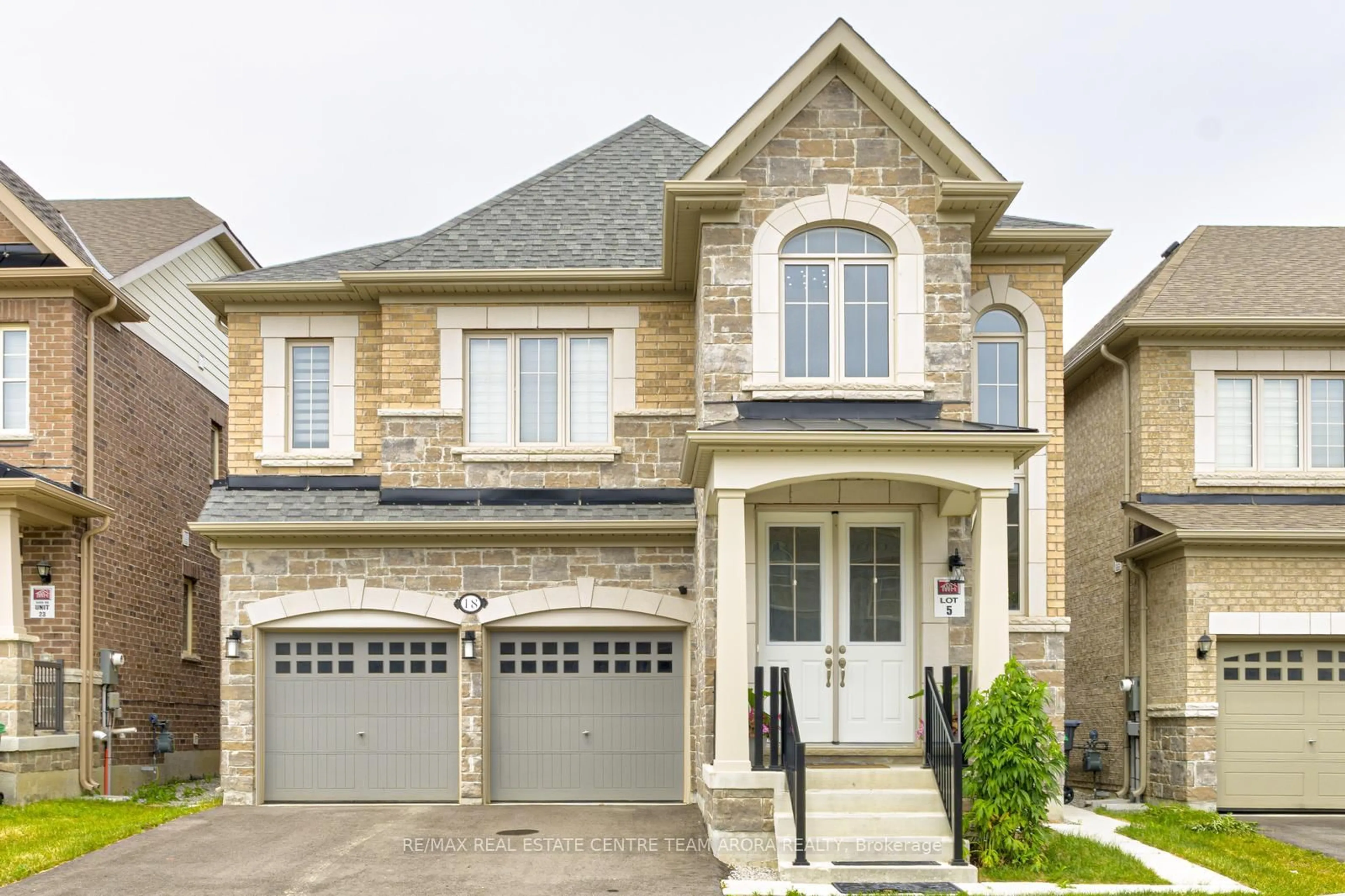 Home with brick exterior material, street for 18 Donald Stewart Rd, Brampton Ontario L7A 5J8