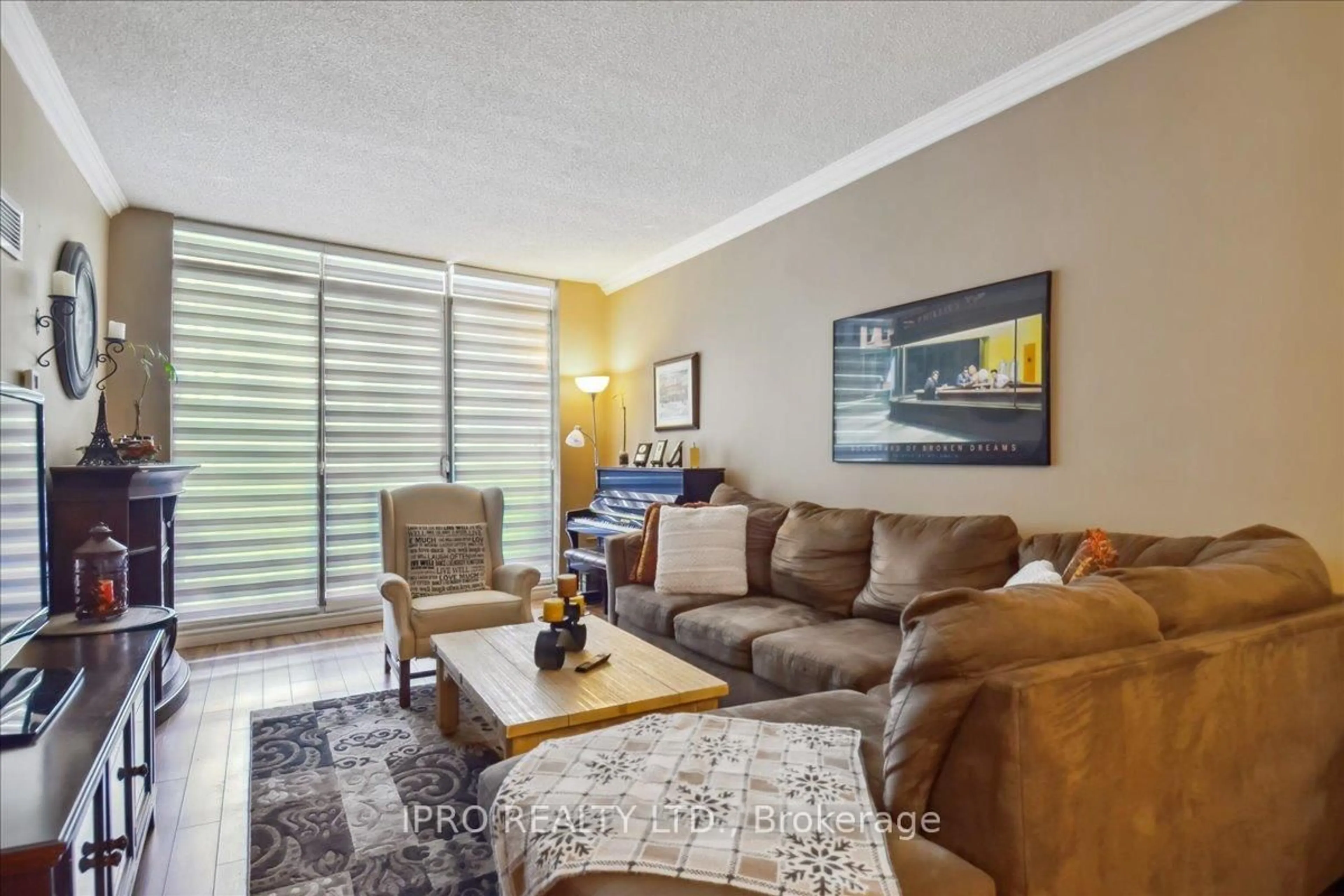 Living room with furniture, unknown for 299 Mill Rd #109, Toronto Ontario M9C 4V9