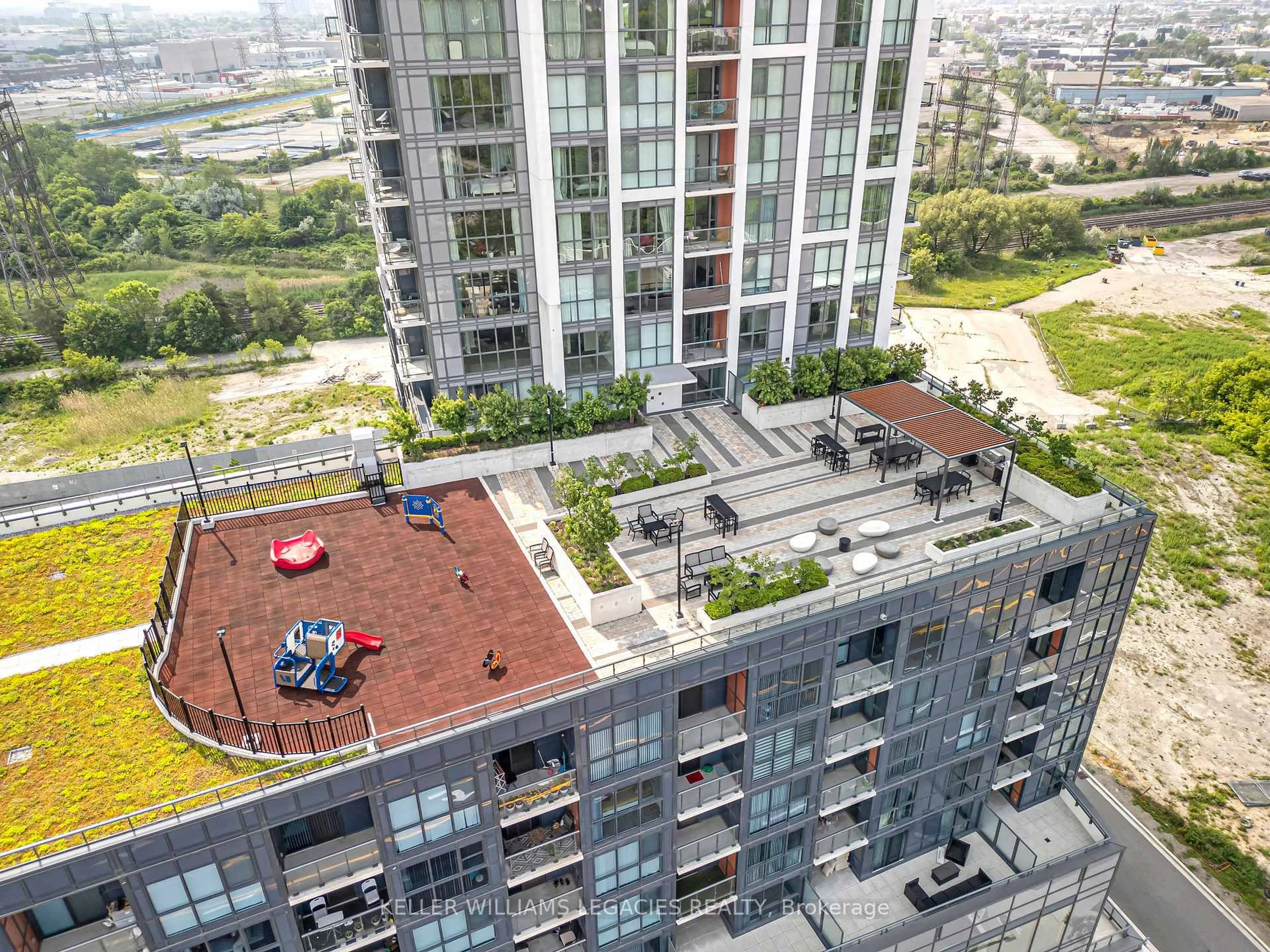 A pic from outside/outdoor area/front of a property/back of a property/a pic from drone, city buildings view from balcony for 50 Thomas Riley Rd #720, Toronto Ontario M9B 0C5