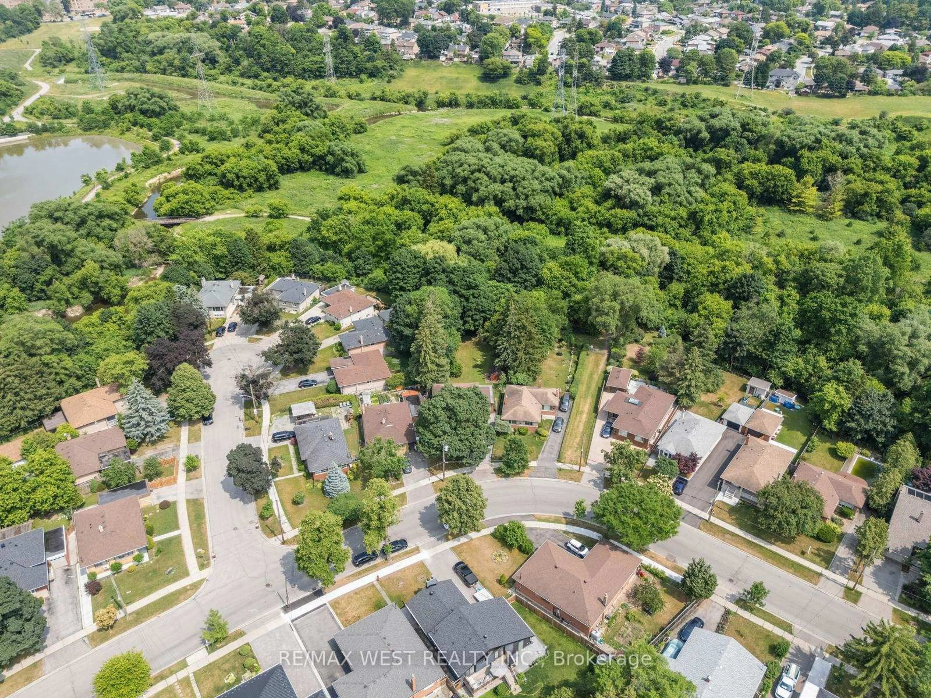 A pic from outside/outdoor area/front of a property/back of a property/a pic from drone, street for 169 Thistle Down Blvd, Toronto Ontario M9V 1J7