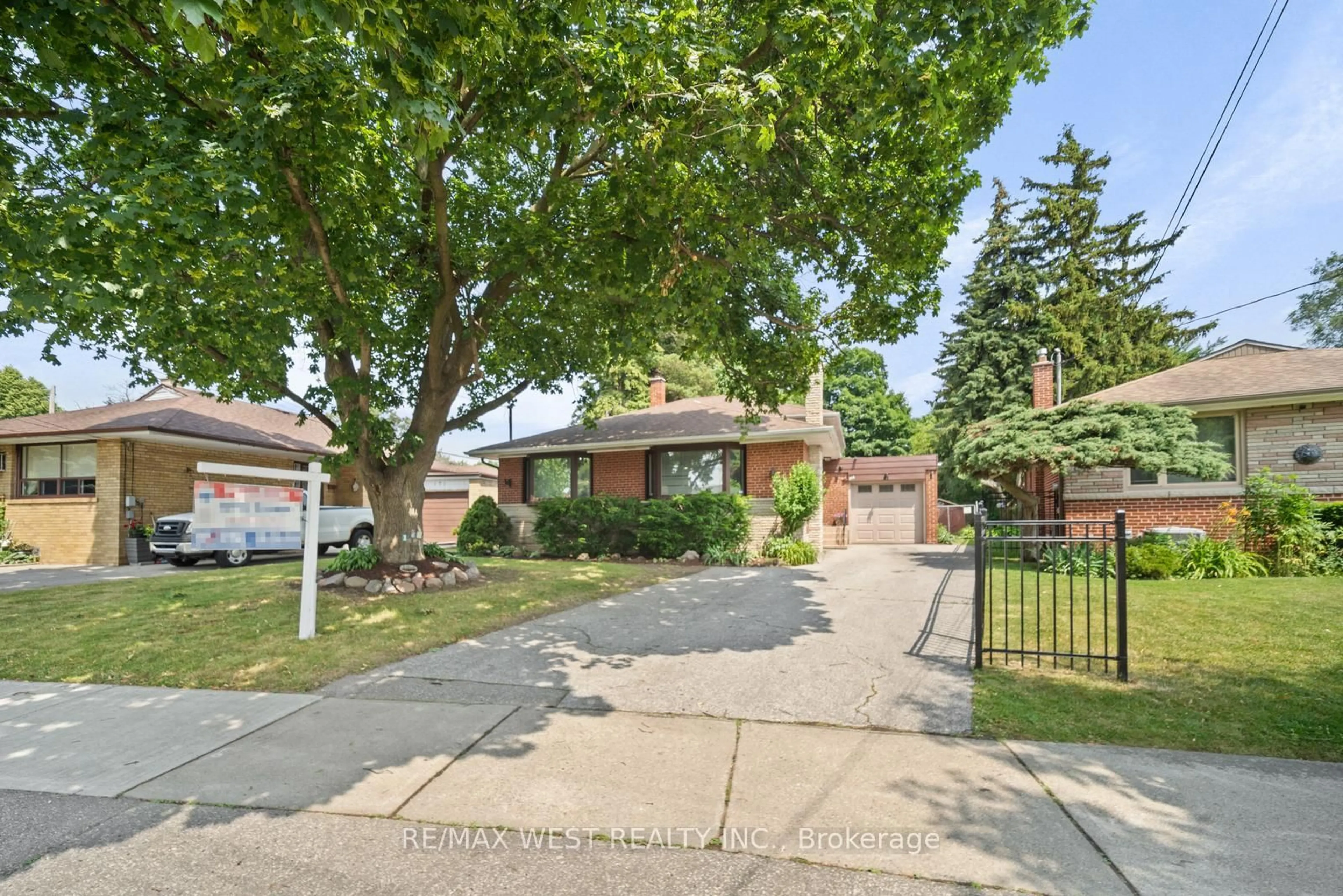 Home with brick exterior material, street for 169 Thistle Down Blvd, Toronto Ontario M9V 1J7