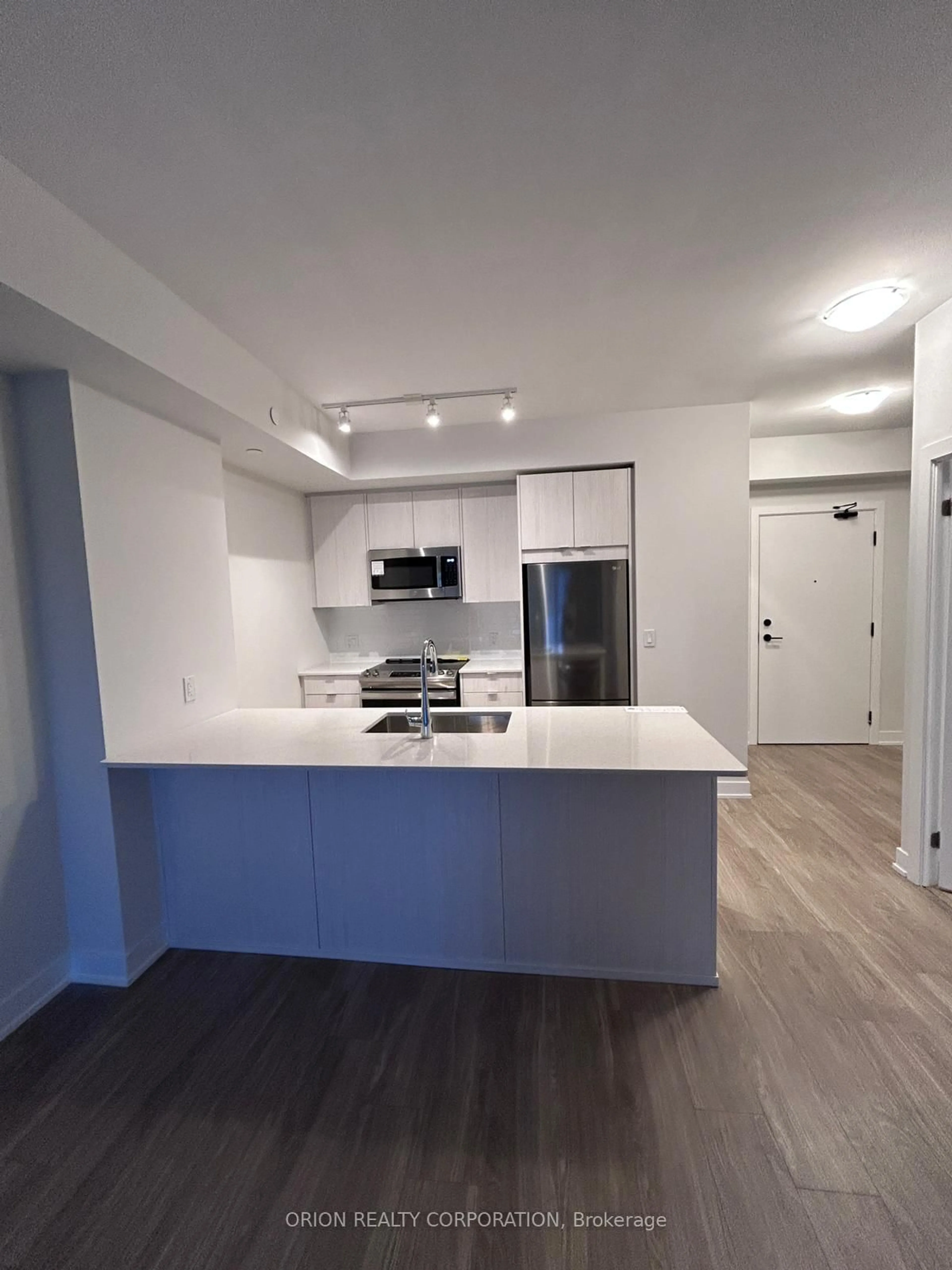 Open concept kitchen, wood/laminate floor for 4130 Parkside Village Dr #1602, Mississauga Ontario L5B 0L6