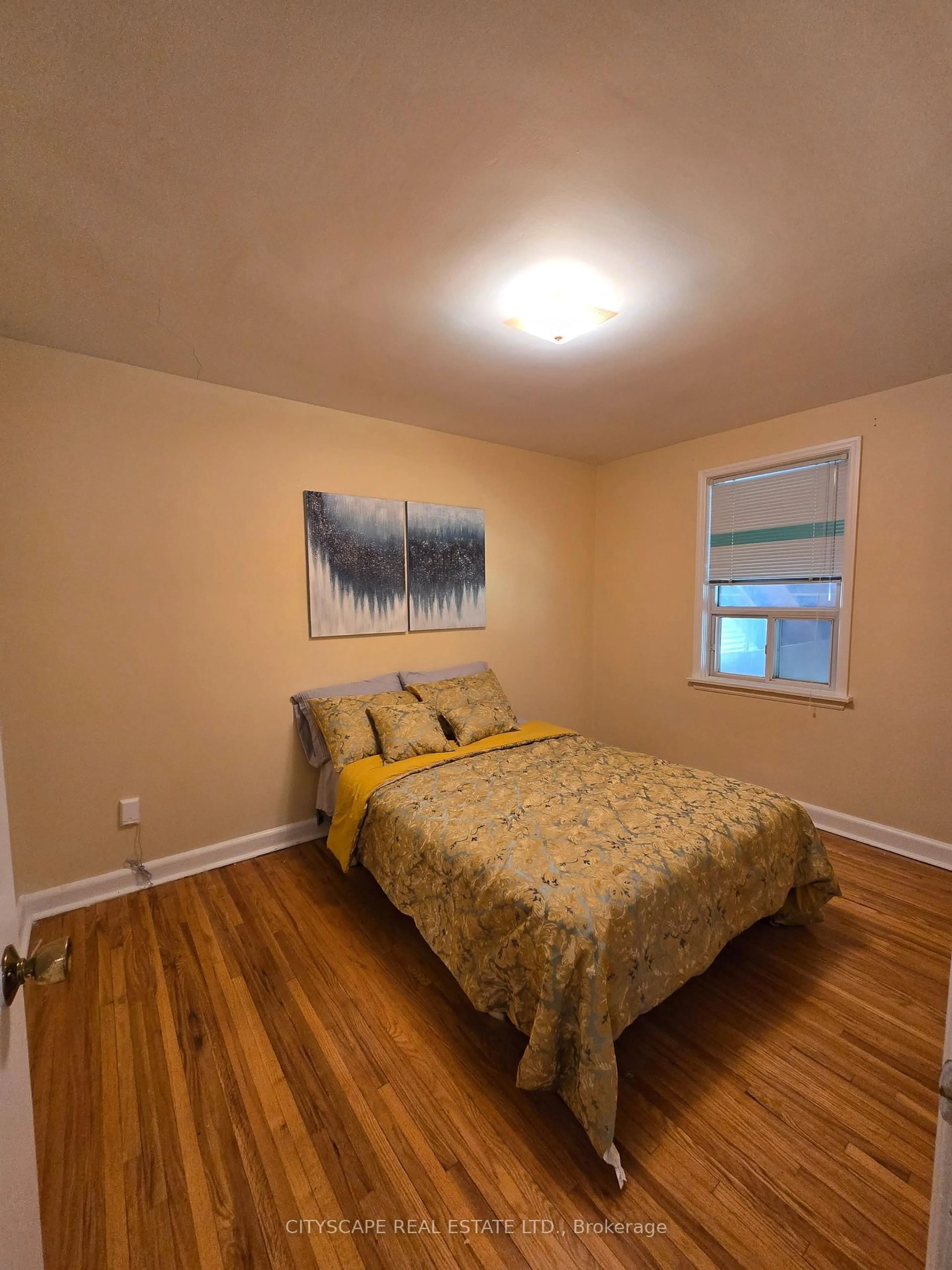 Bedroom with bed, wood/laminate floor for 1 Letchworth Cres, Toronto Ontario M3M 1Y7