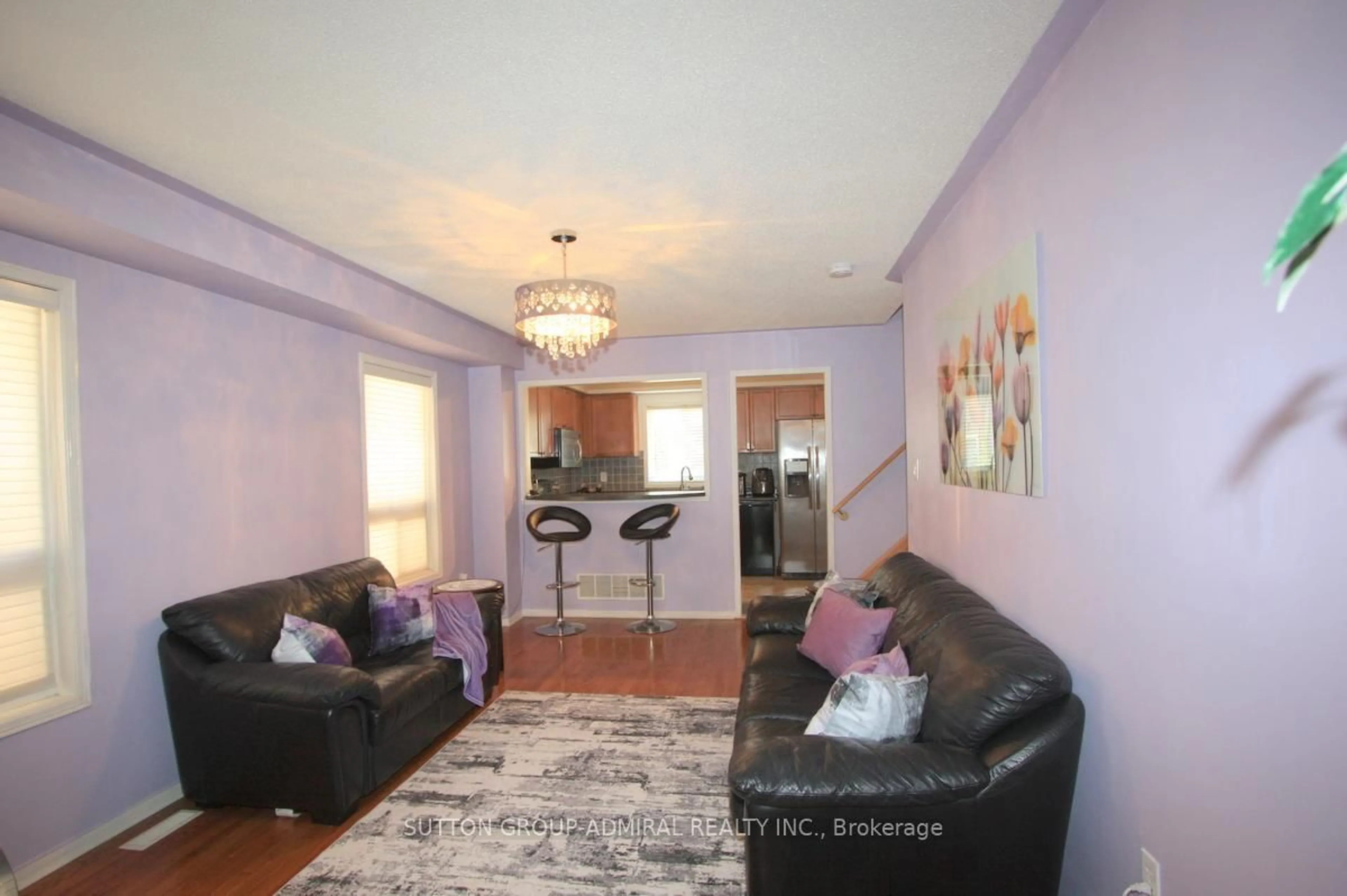 Living room with furniture, wood/laminate floor for 5868 Blue Spruce Ave, Burlington Ontario L7L 7N8