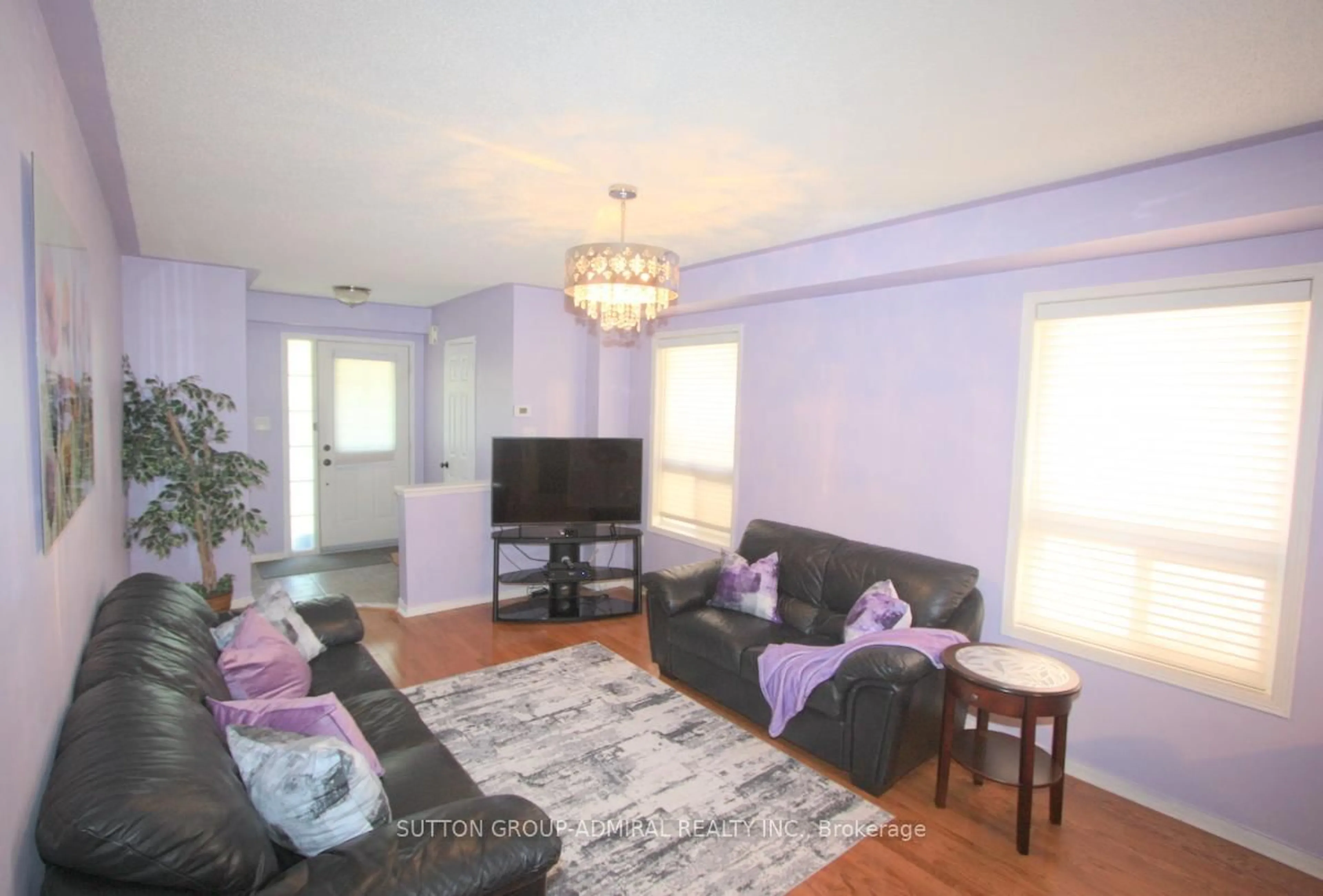 Living room with furniture, wood/laminate floor for 5868 Blue Spruce Ave, Burlington Ontario L7L 7N8