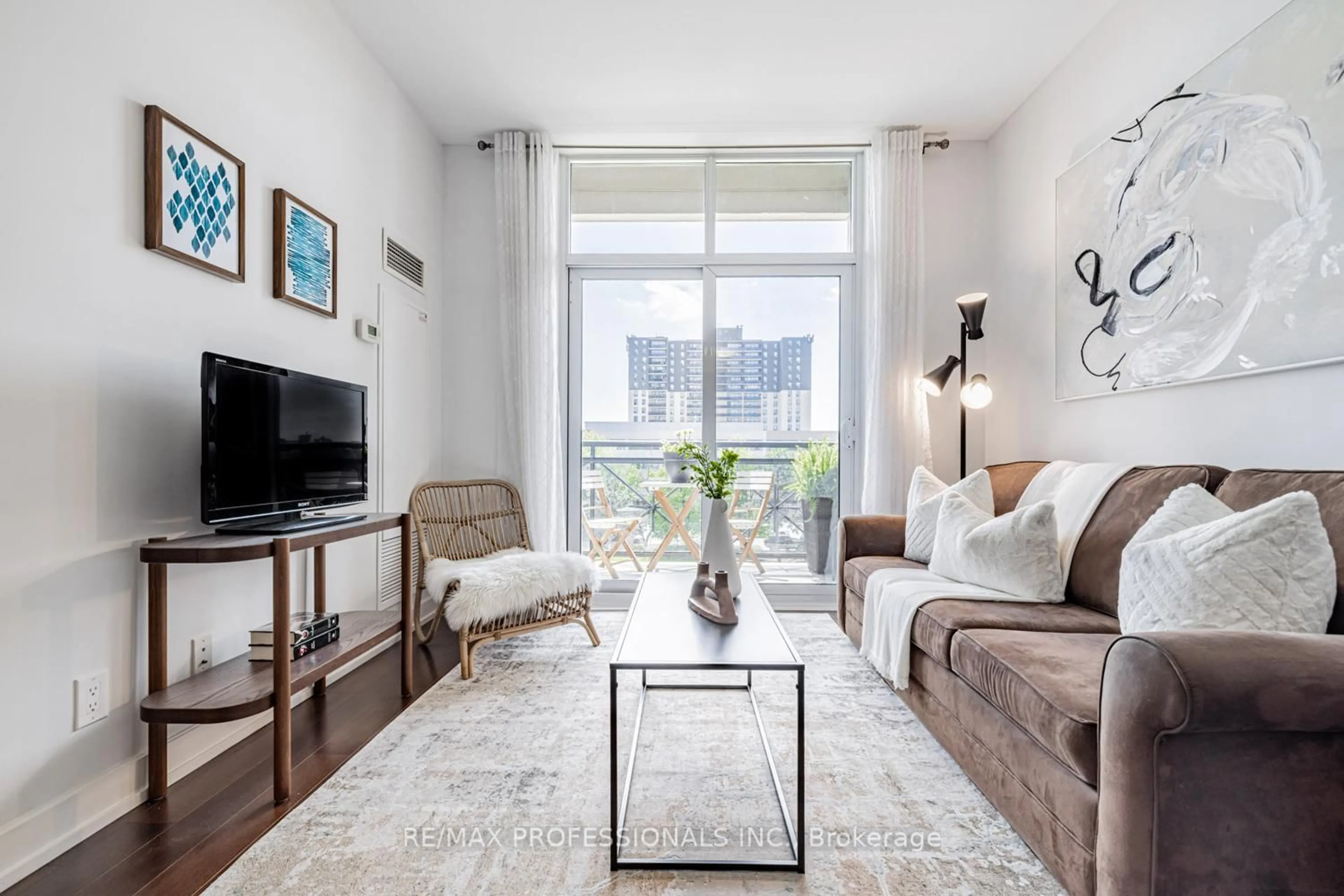 Living room with furniture, unknown for 6 Eva Rd #205, Toronto Ontario M9C 0B1