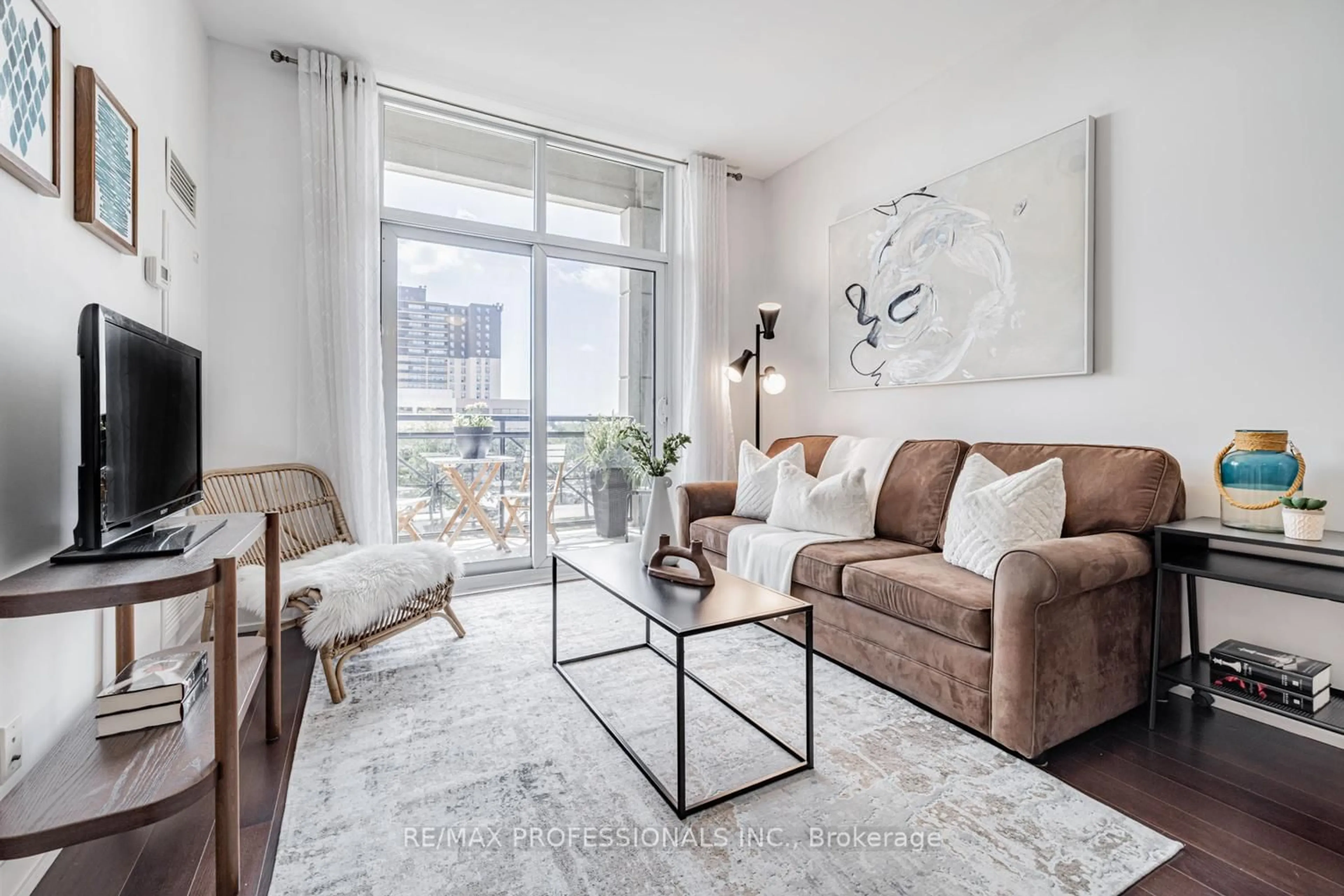 Living room with furniture, unknown for 6 Eva Rd #205, Toronto Ontario M9C 0B1