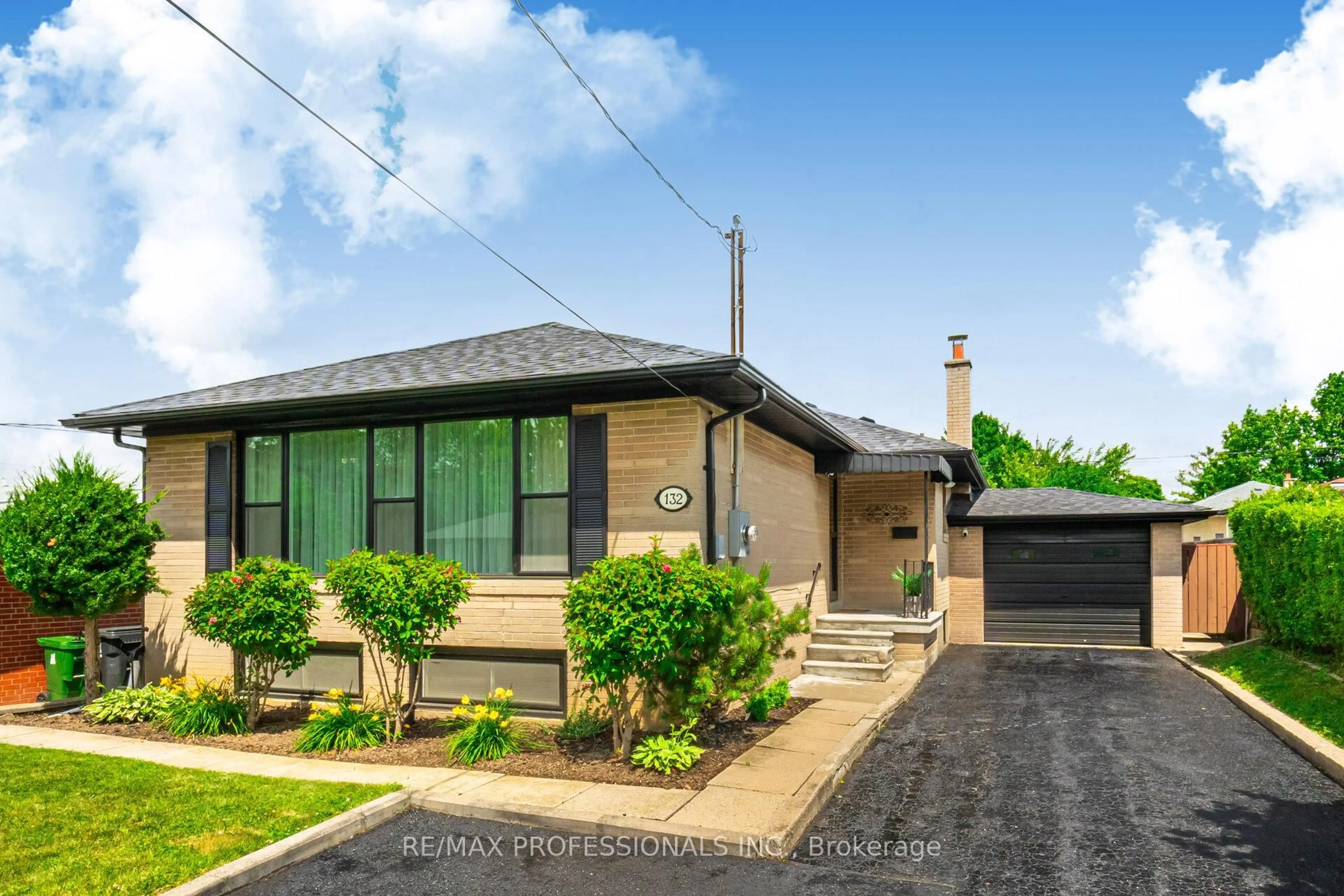 Home with brick exterior material, street for 132 Wyndale Dr, Toronto Ontario M6L 1G3