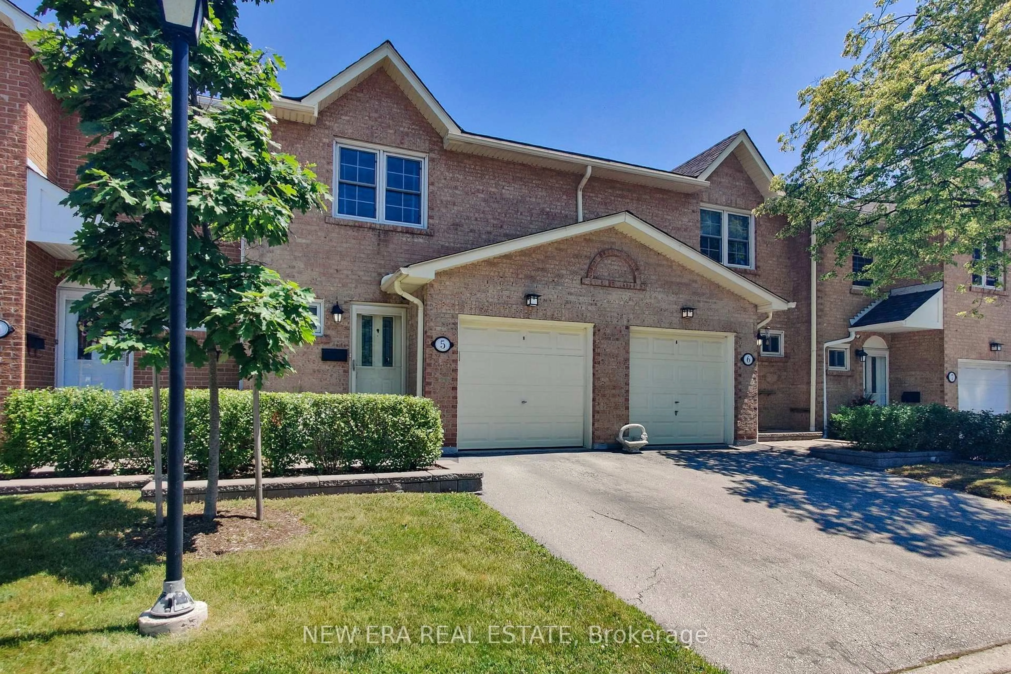 A pic from outside/outdoor area/front of a property/back of a property/a pic from drone, street for 1951 Rathburn Rd #5, Mississauga Ontario L4W 2N9