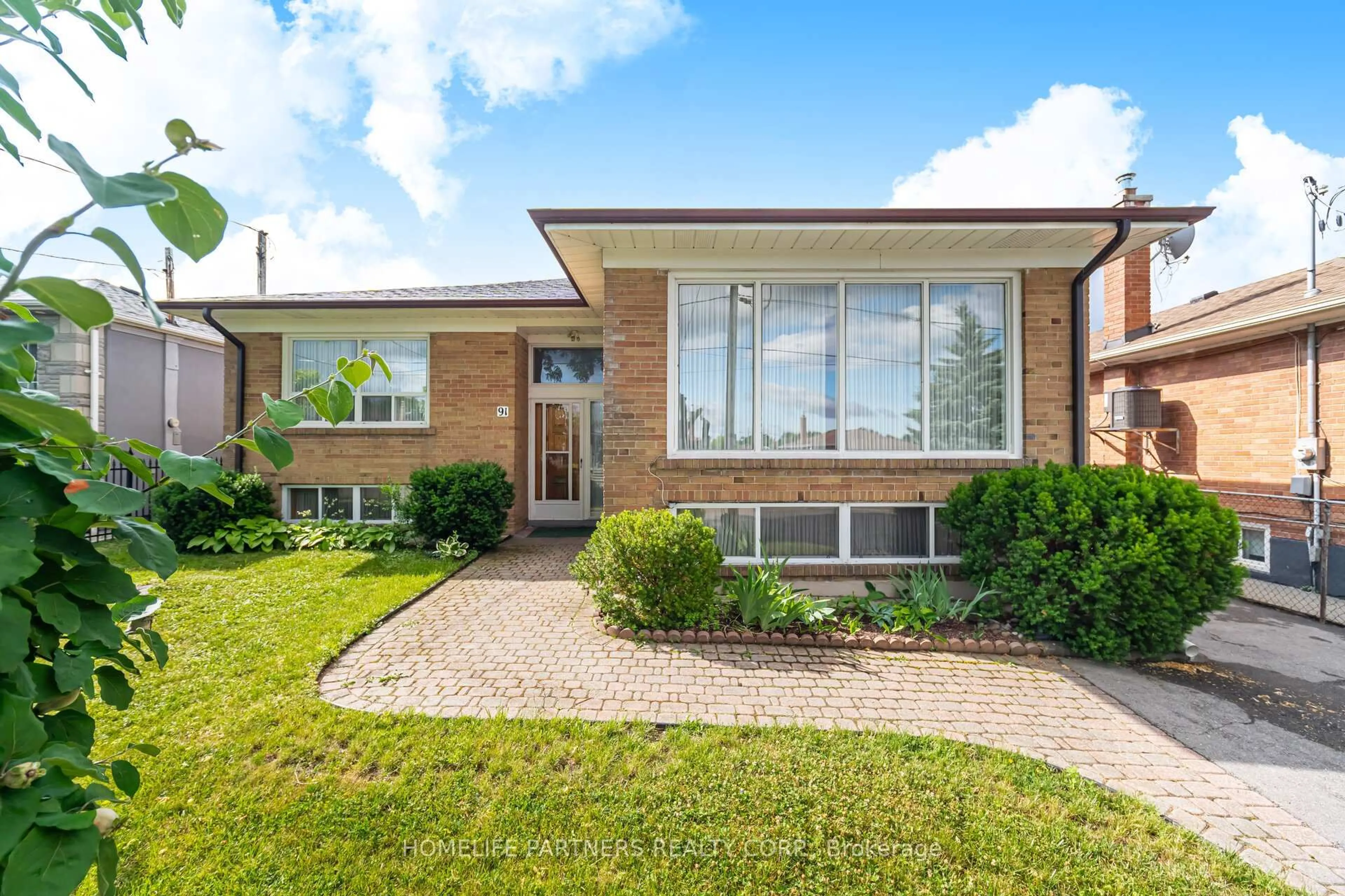 Home with brick exterior material, street for 91 Denbigh Cres, Toronto Ontario M3M 2T4