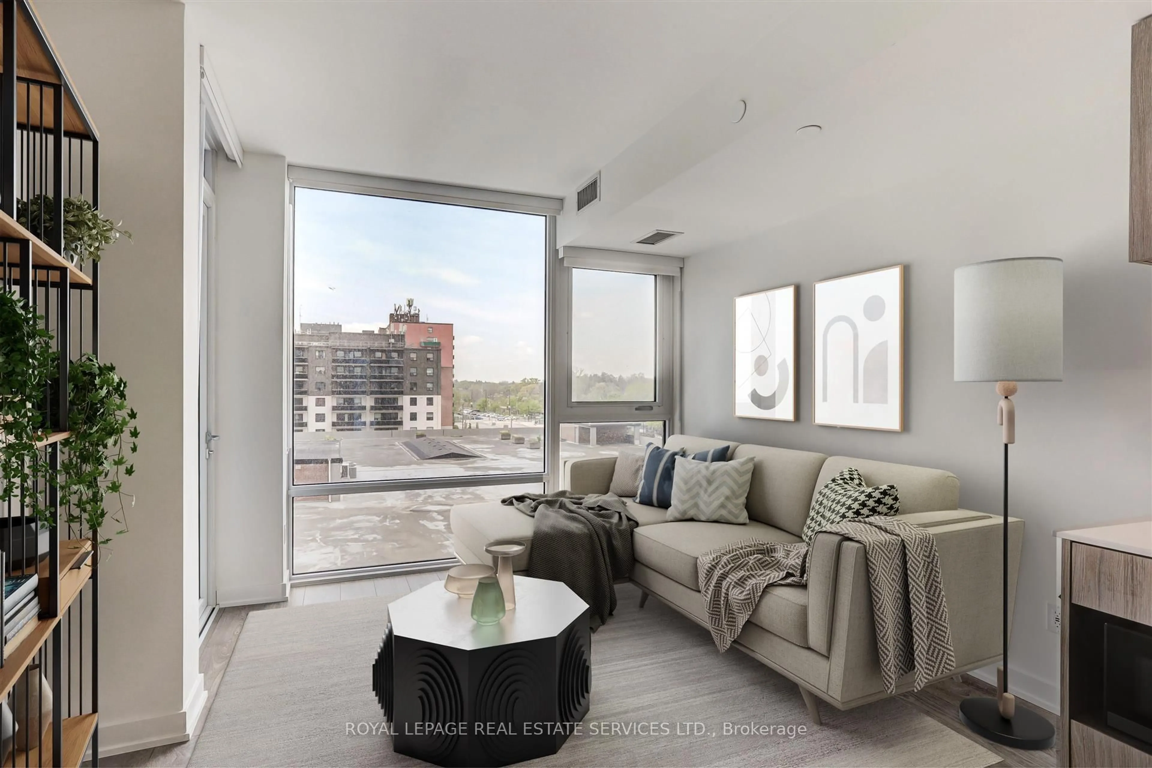 Living room with furniture, cement floor for 28 Ann St #417, Mississauga Ontario L5G 3G1
