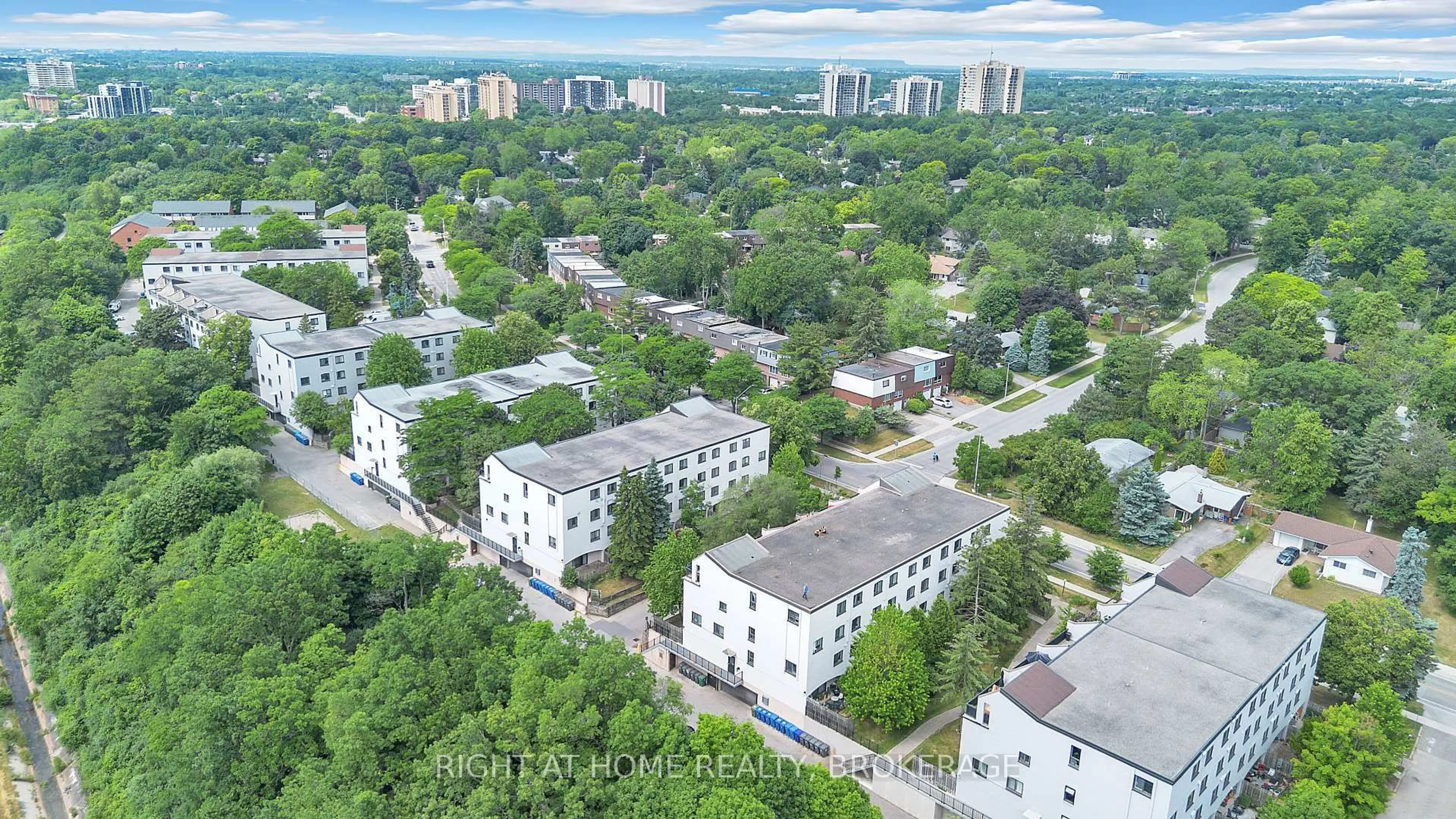 A pic from outside/outdoor area/front of a property/back of a property/a pic from drone, city buildings view from balcony for 1058 Falgarwood Dr #132, Oakville Ontario L6H 2P3