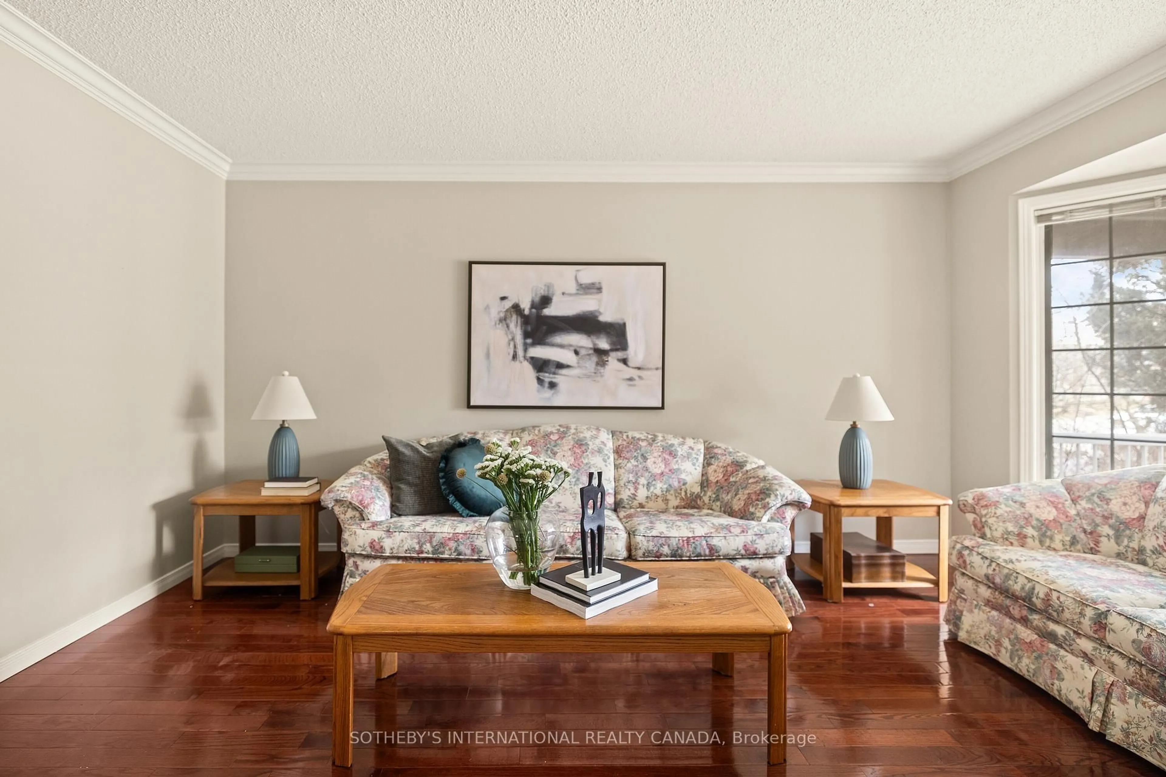Living room with furniture, wood/laminate floor for 52 Red Cedar Cres, Brampton Ontario L6R 1A7