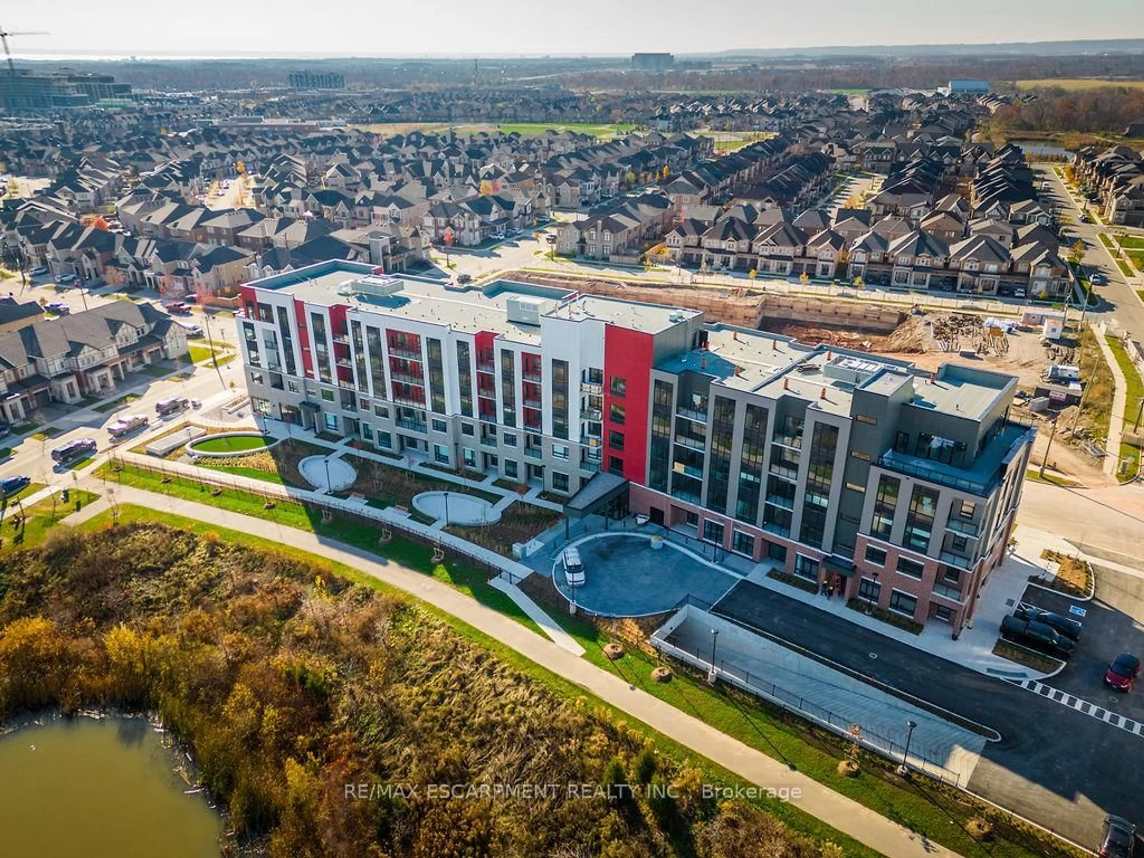 A pic from outside/outdoor area/front of a property/back of a property/a pic from drone, city buildings view from balcony for 3265 Carding Mill Tr #205, Oakville Ontario L6M 5P7
