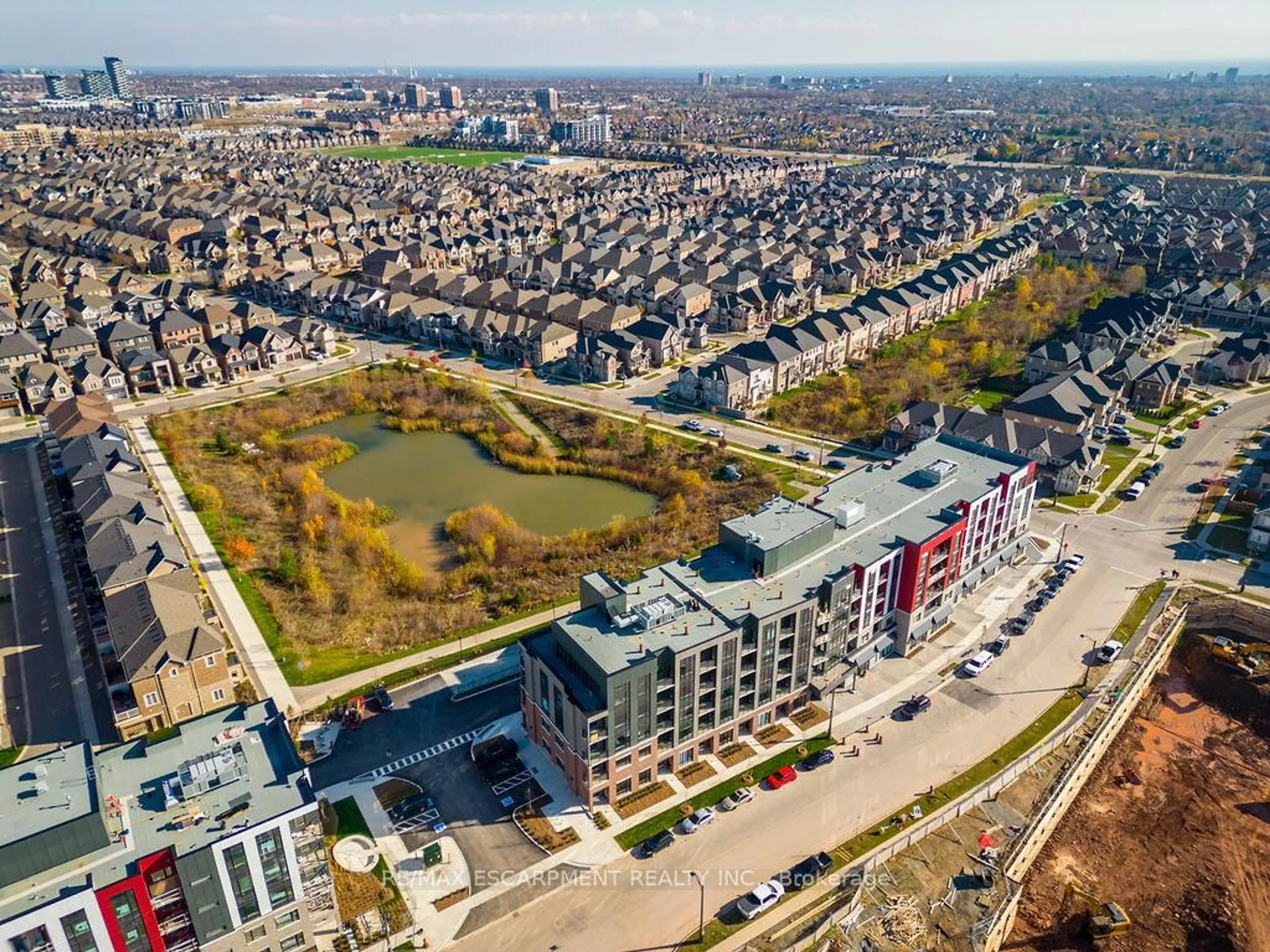 A pic from outside/outdoor area/front of a property/back of a property/a pic from drone, city buildings view from balcony for 3265 Carding Mill Tr #205, Oakville Ontario L6M 5P7