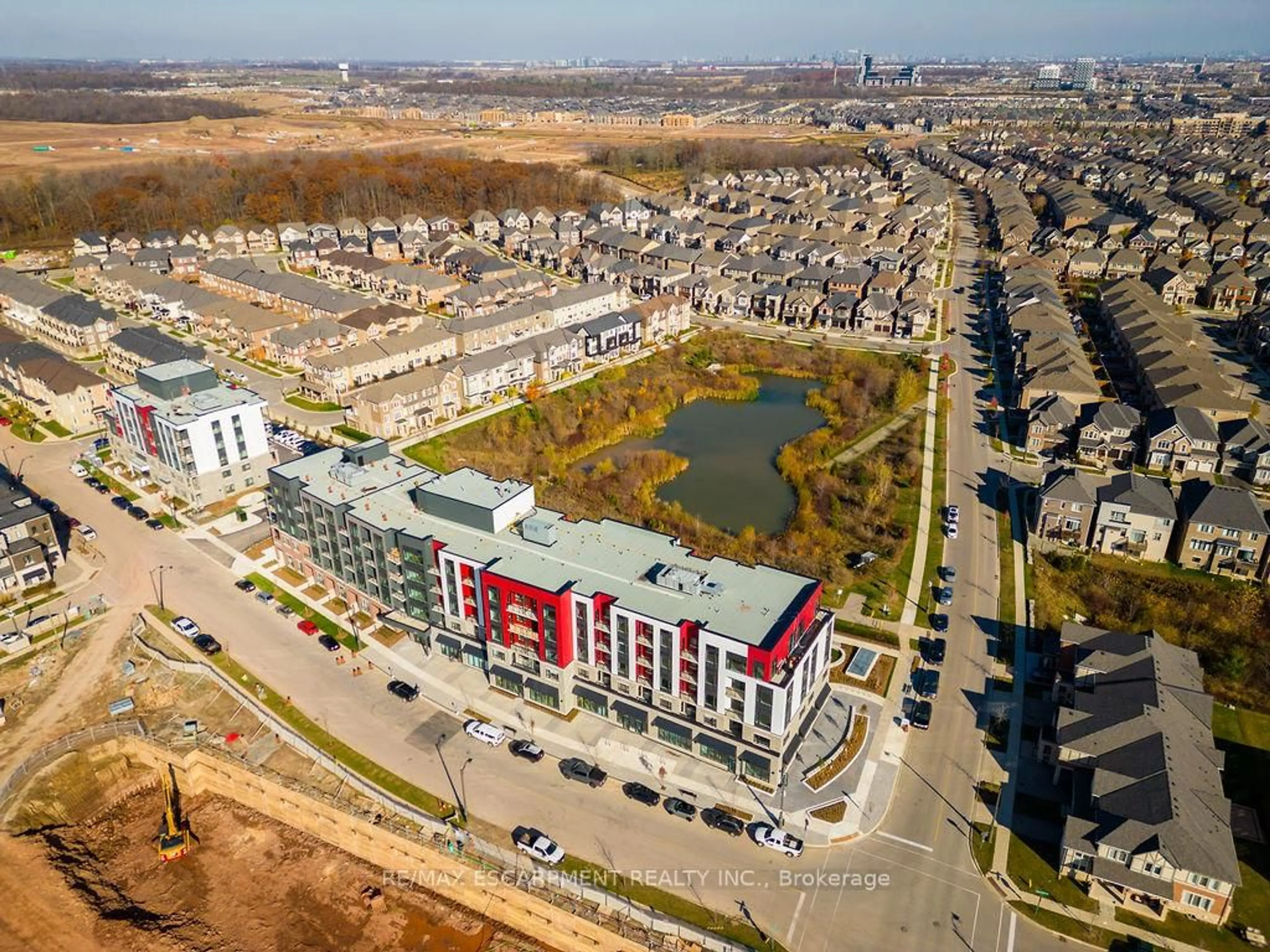 A pic from outside/outdoor area/front of a property/back of a property/a pic from drone, city buildings view from balcony for 3265 Carding Mill Tr #205, Oakville Ontario L6M 5P7