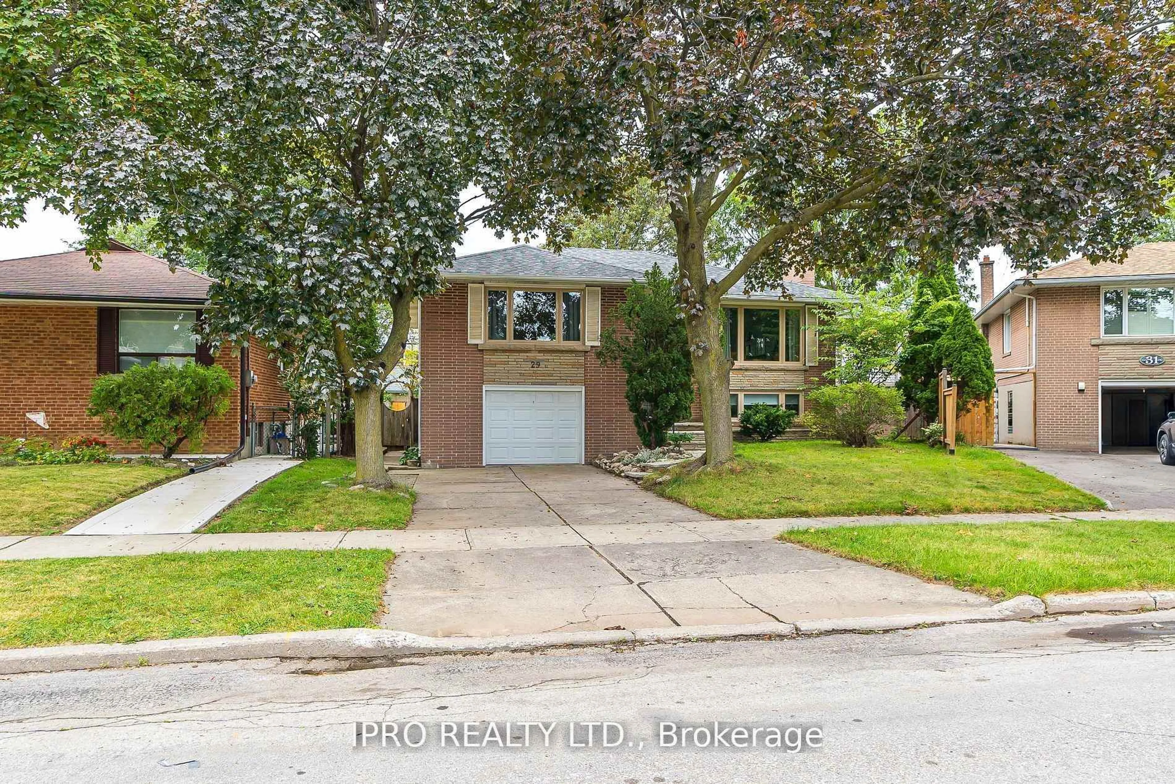 Home with brick exterior material, street for 29 Breadner Dr, Toronto Ontario M9R 3M3
